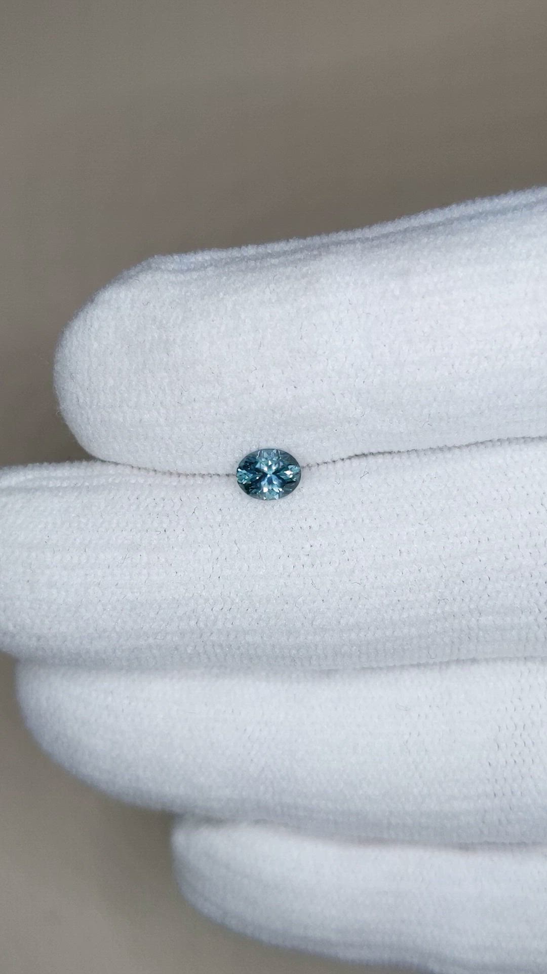 0.47 Ct. Bluish Green Sapphire from Montana Size Video
