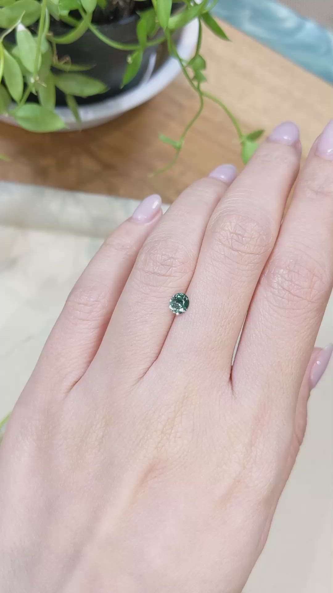 0.47 Ct. Bluish Green Sapphire from Montana Size Video
