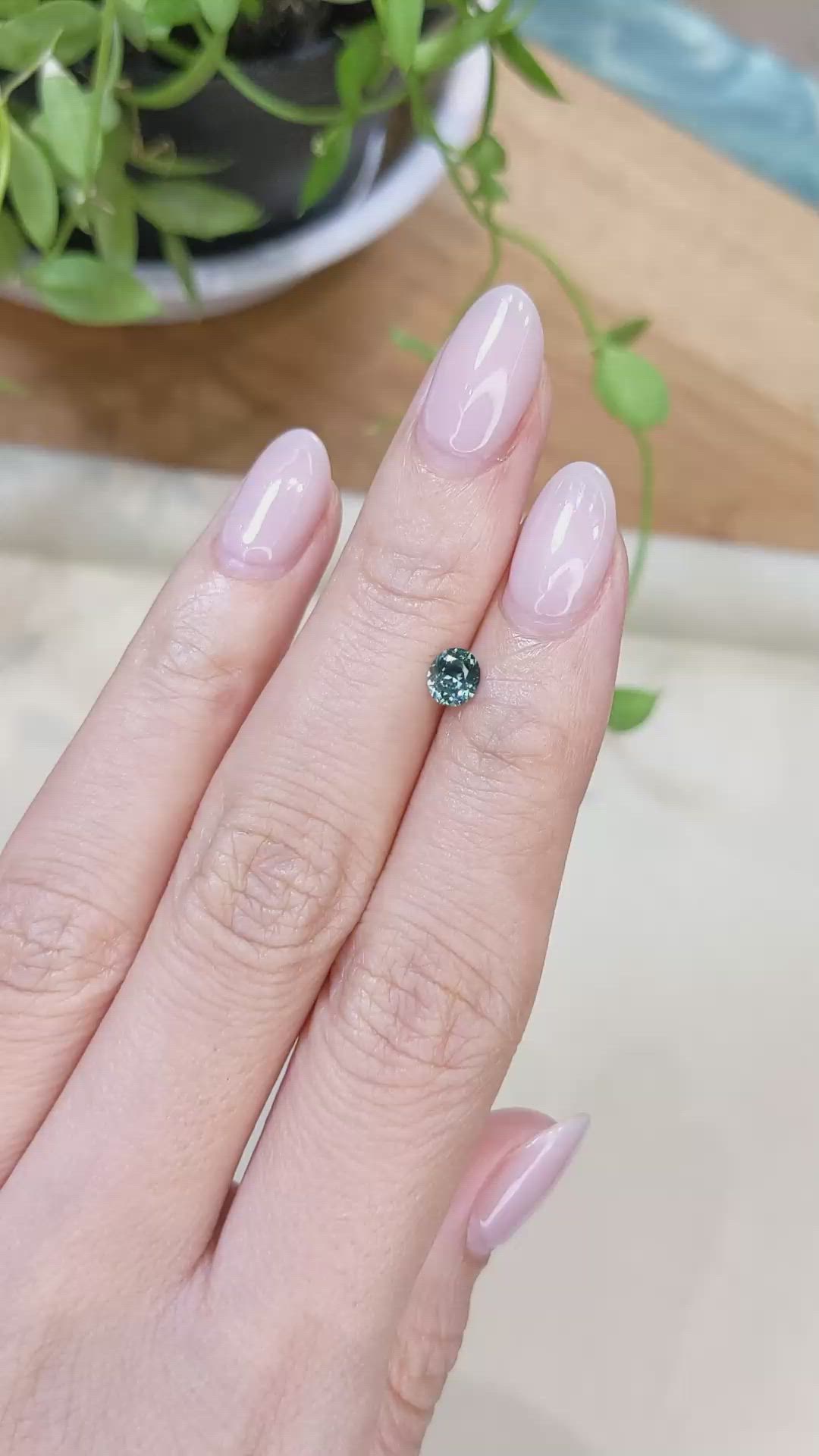 0.47 Ct. Bluish Green Sapphire from Montana Size Video