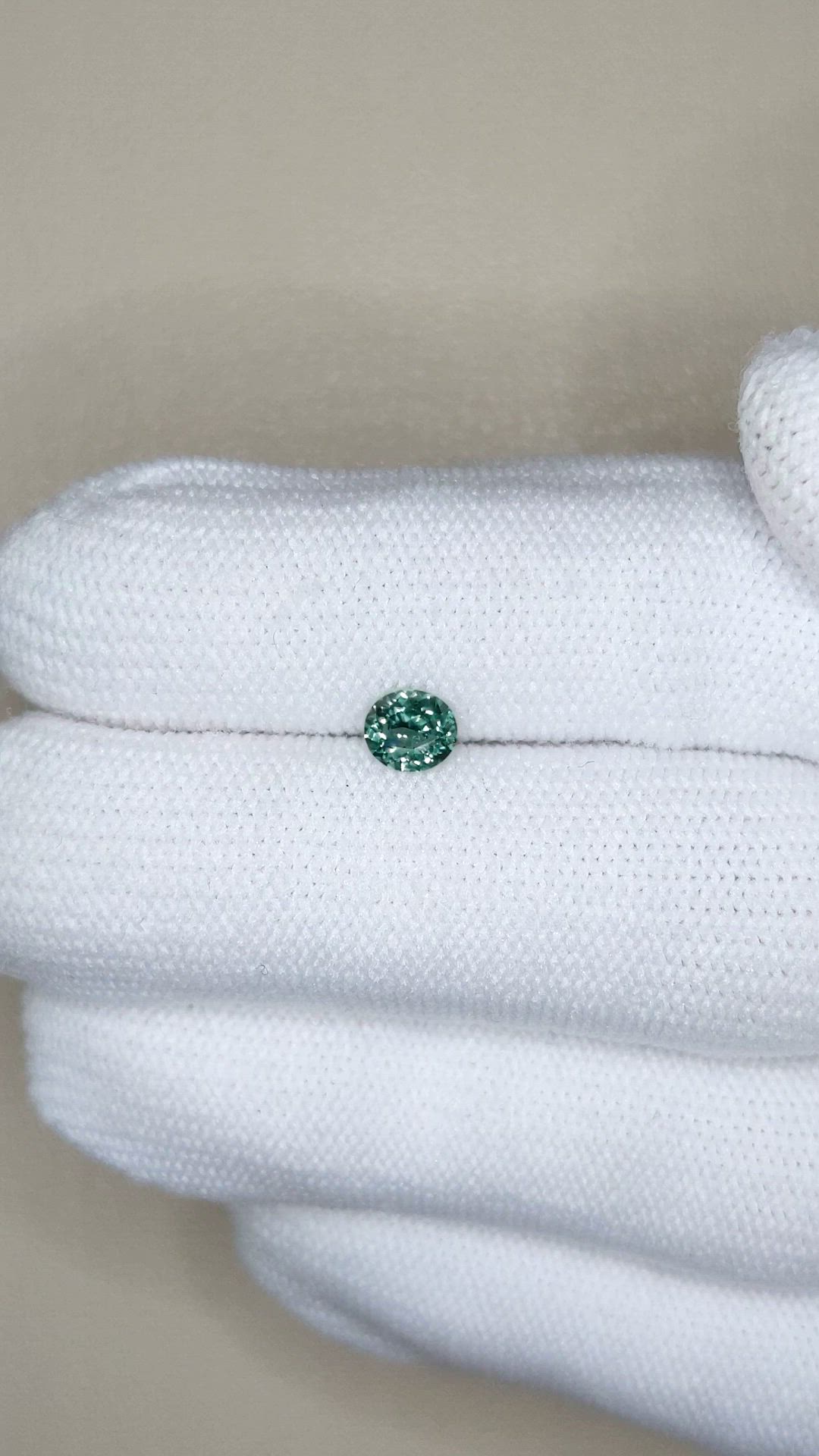 0.47 Ct. Bluish Green Sapphire from Montana Size Video