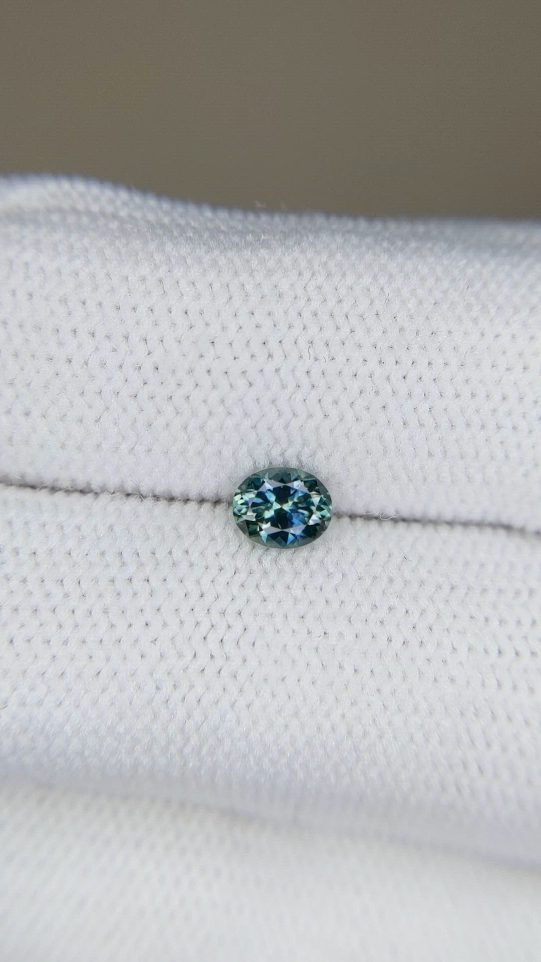 0.47 Ct. Bluish Green Sapphire from Montana Size Video
