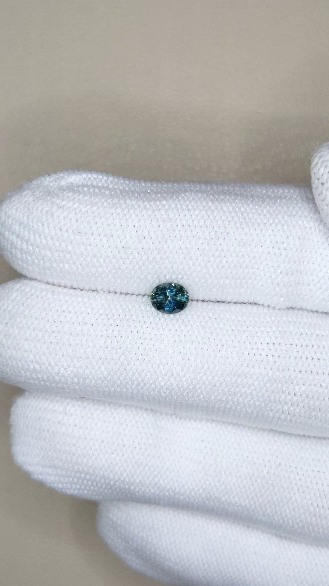 0.47 Ct. Bluish Green Sapphire from Montana Size Video