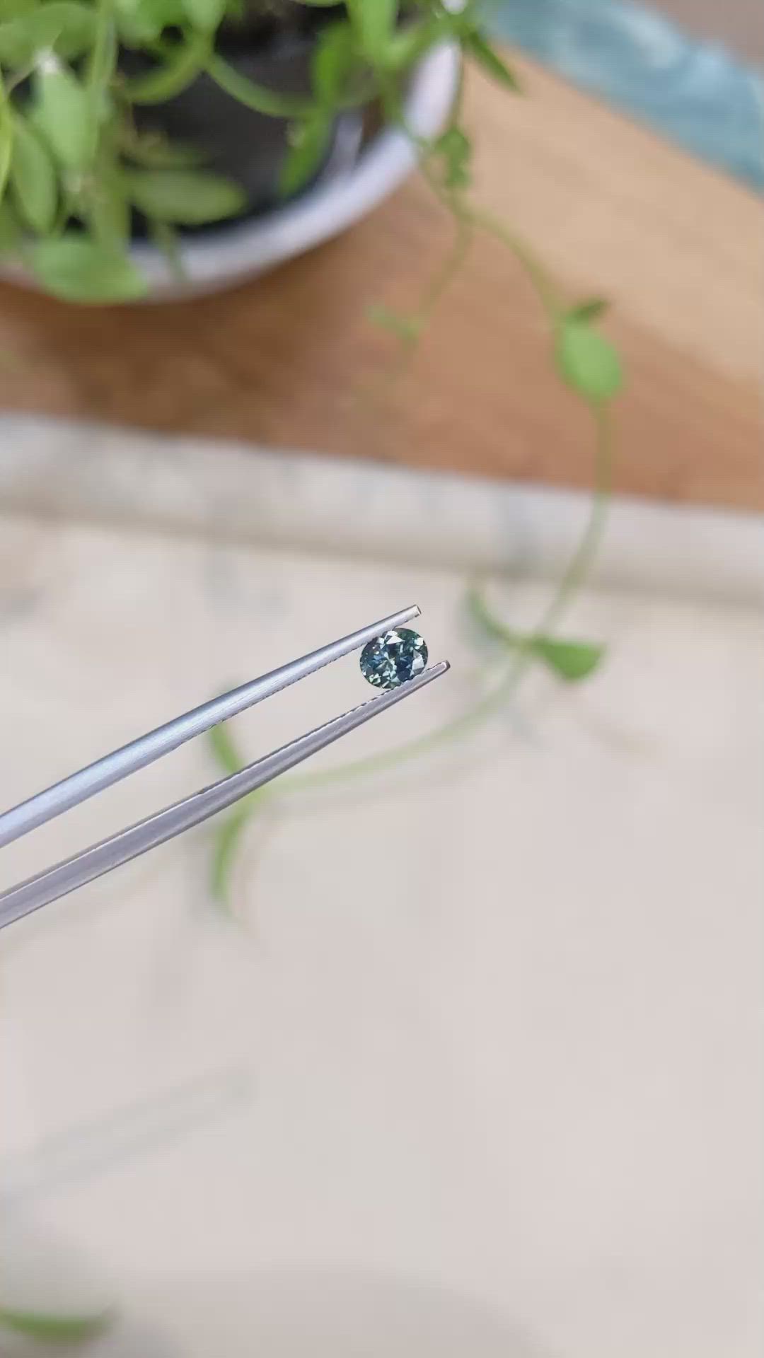 0.47 Ct. Bluish Green Sapphire from Montana Size Video