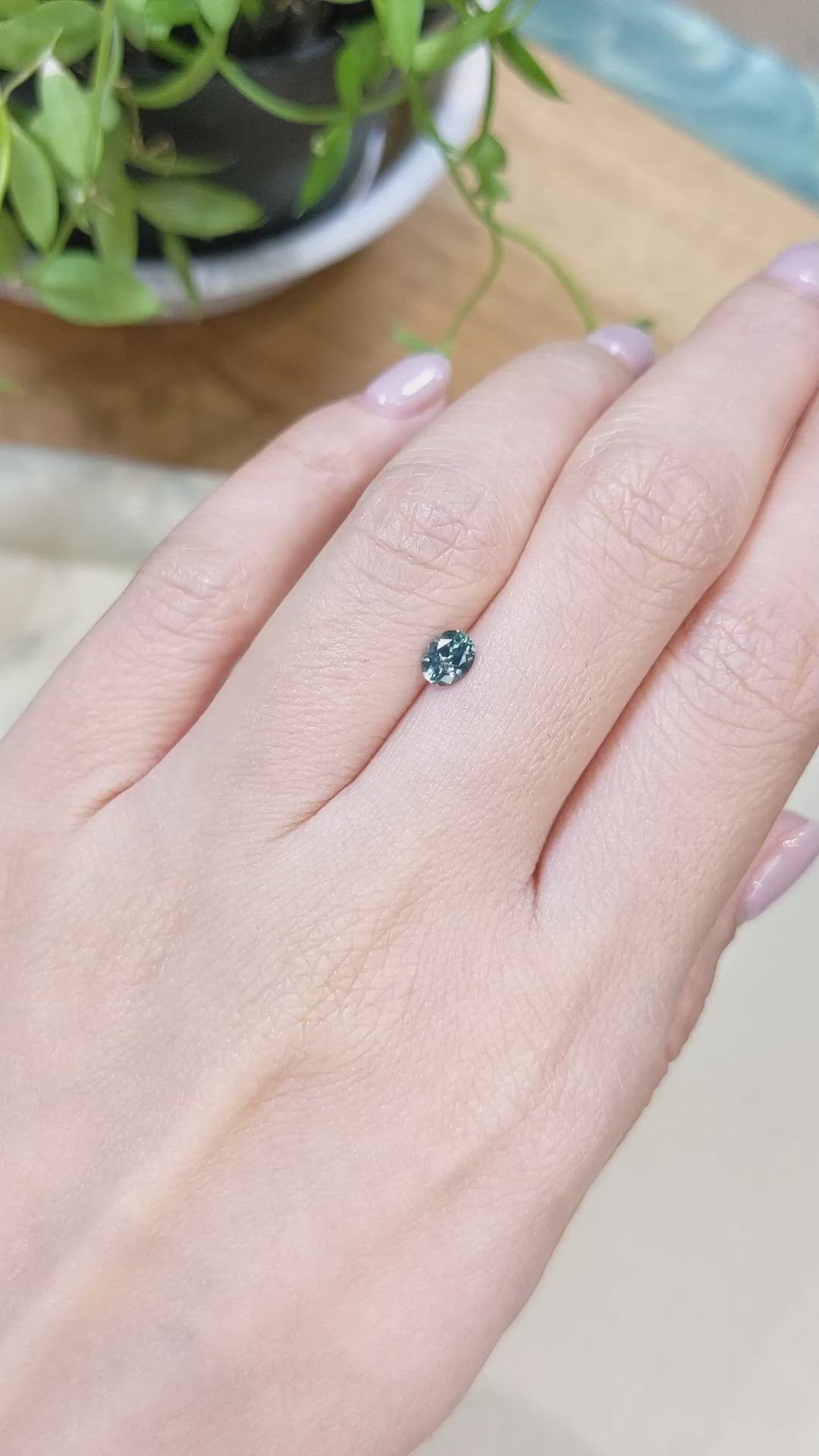 0.47 Ct. Bluish Green Sapphire from Montana Size Video