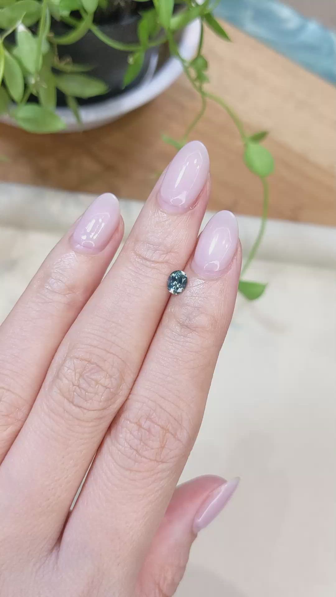 0.47 Ct. Bluish Green Sapphire from Montana Size Video