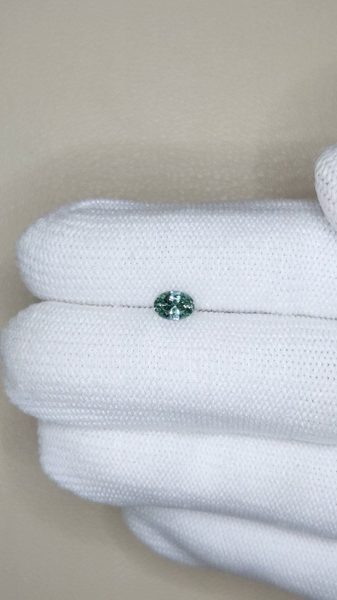 0.48 Ct. Bluish Green Sapphire from Montana Size Video