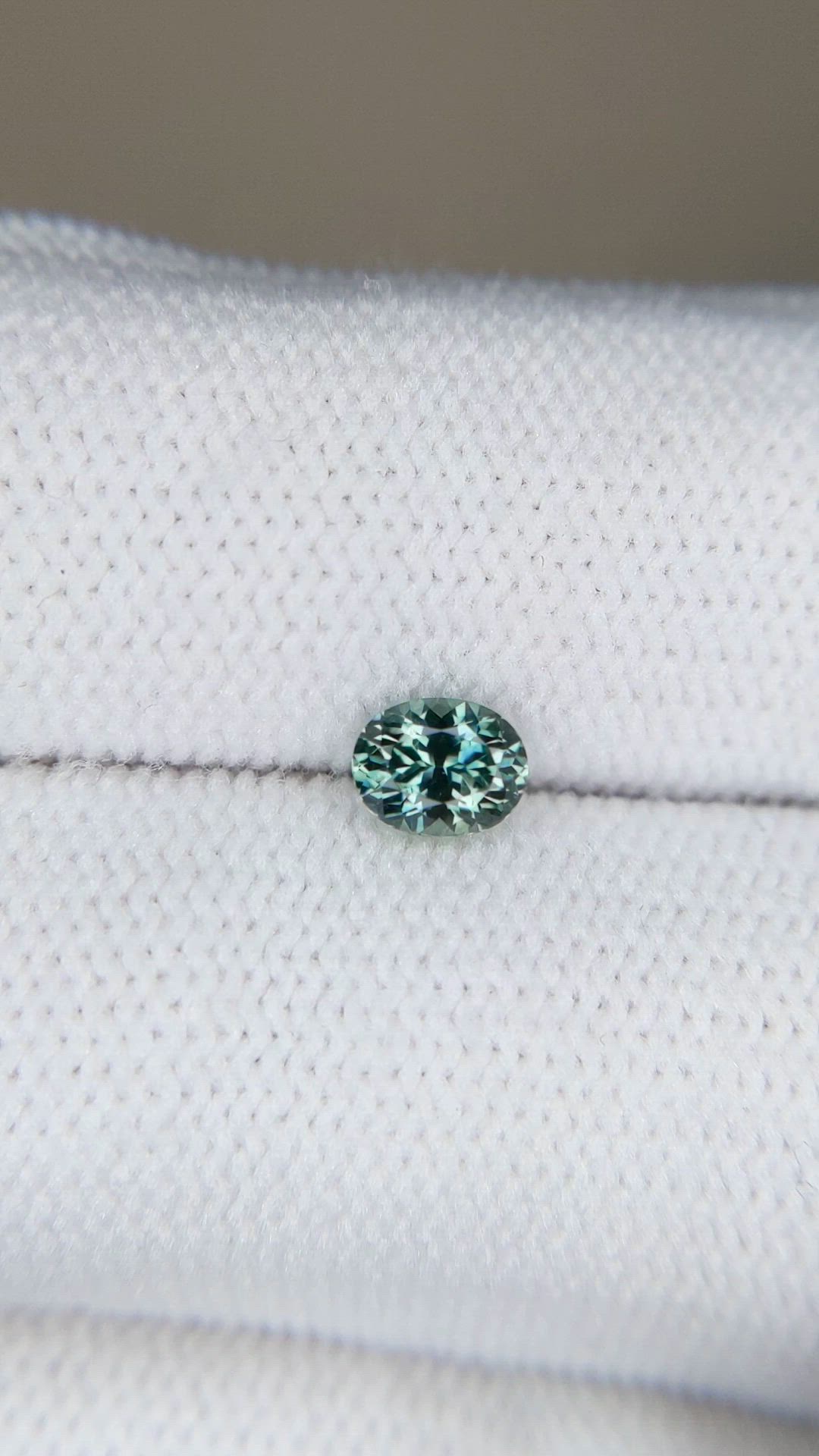 0.49 Ct. Bluish Green Sapphire from Montana Size Video