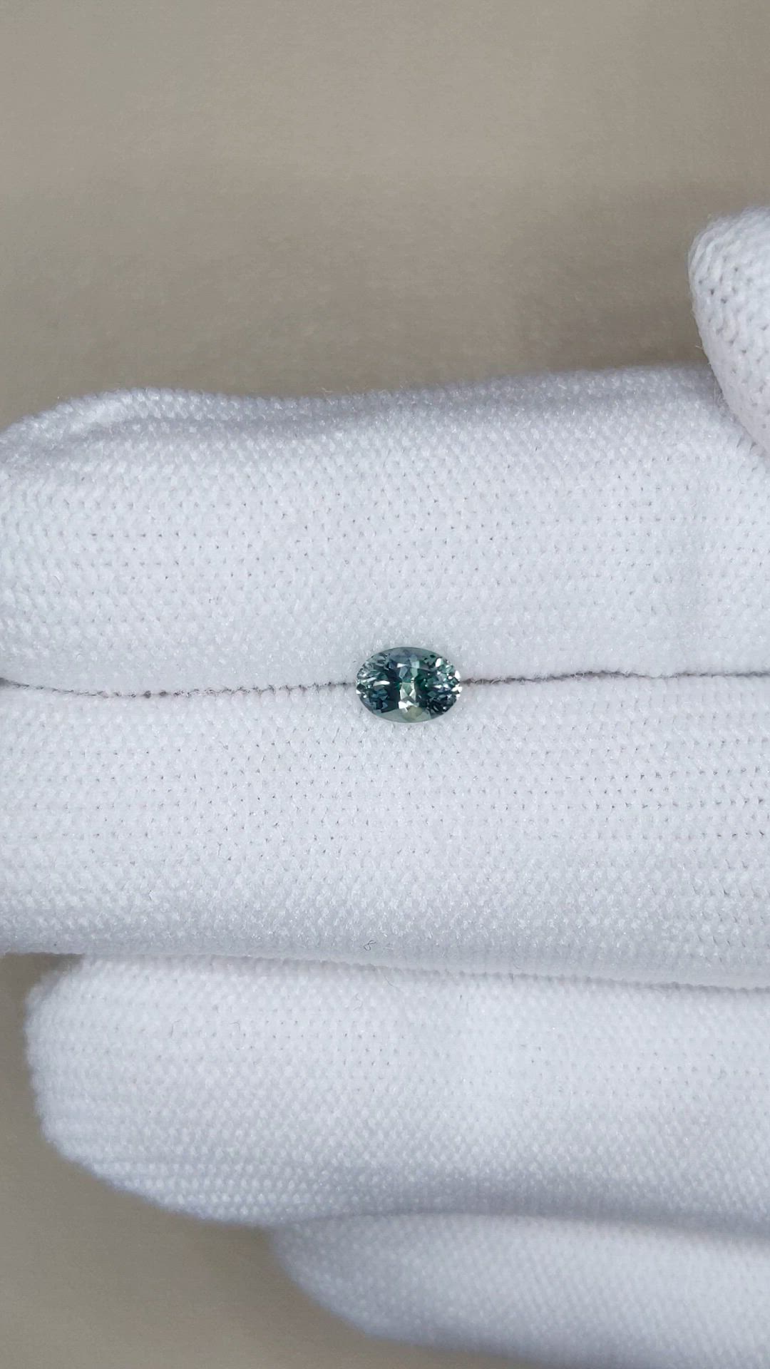 0.49 Ct. Bluish Green Sapphire from Montana Size Video