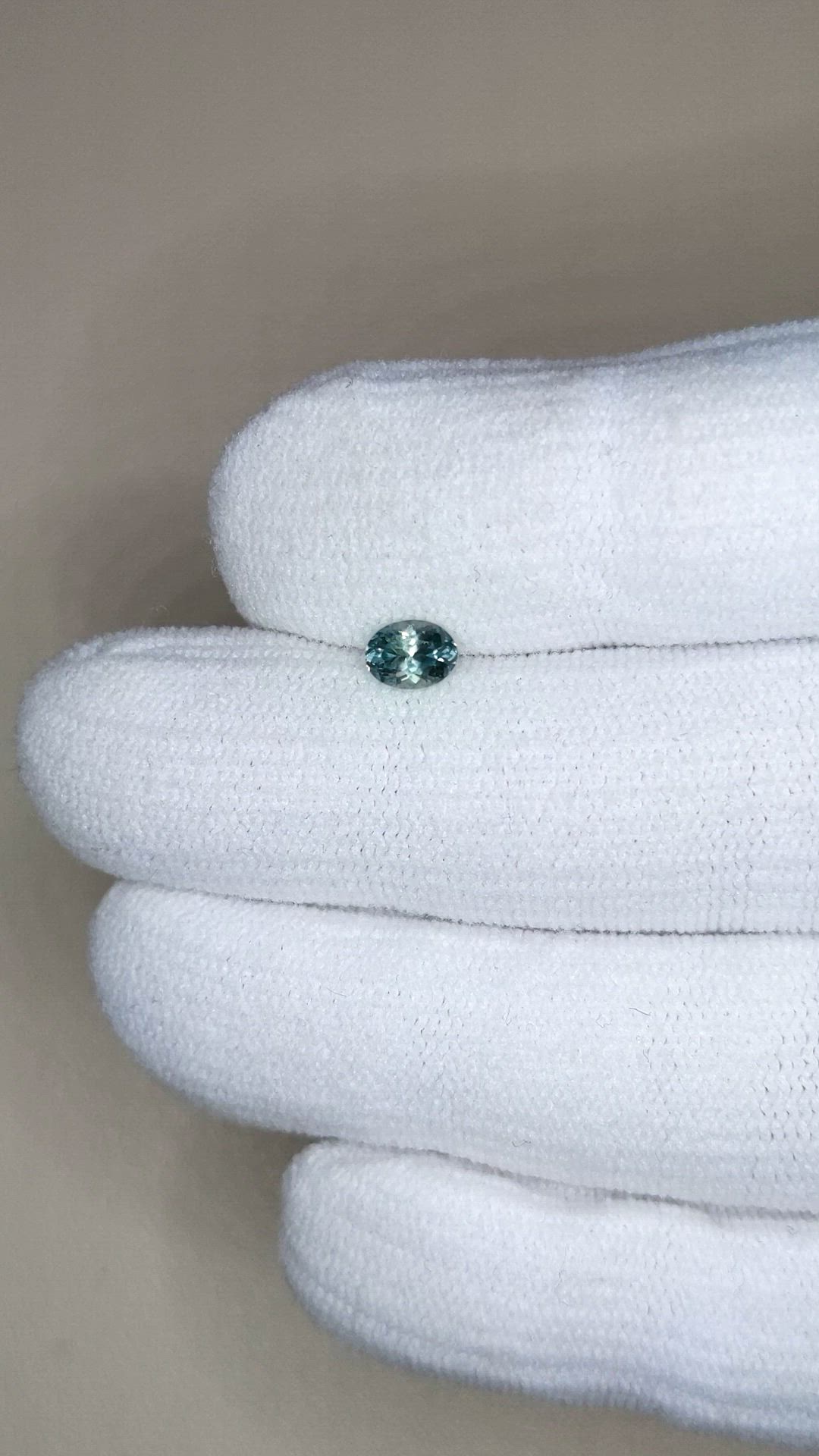 0.48 Ct. Bluish Green Sapphire from Montana Size Video