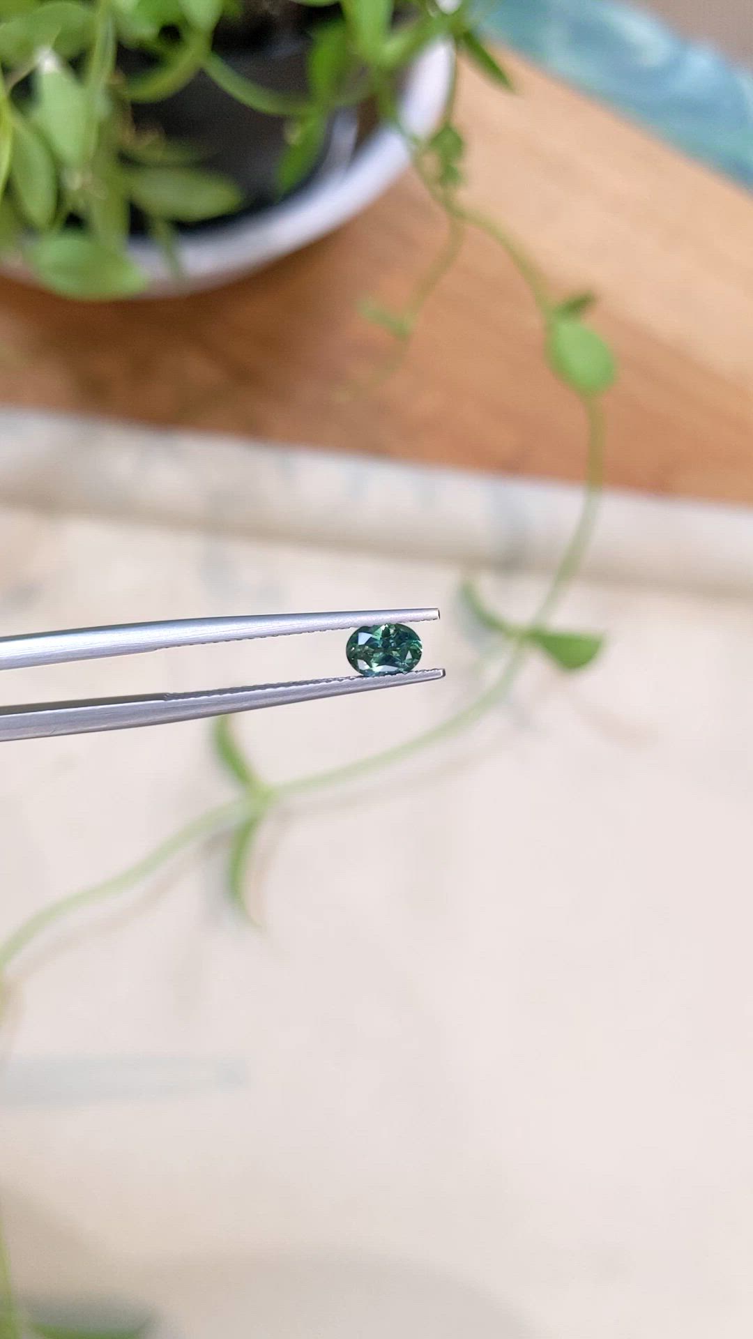 0.49 Ct. Bluish Green Sapphire from Montana Size Video