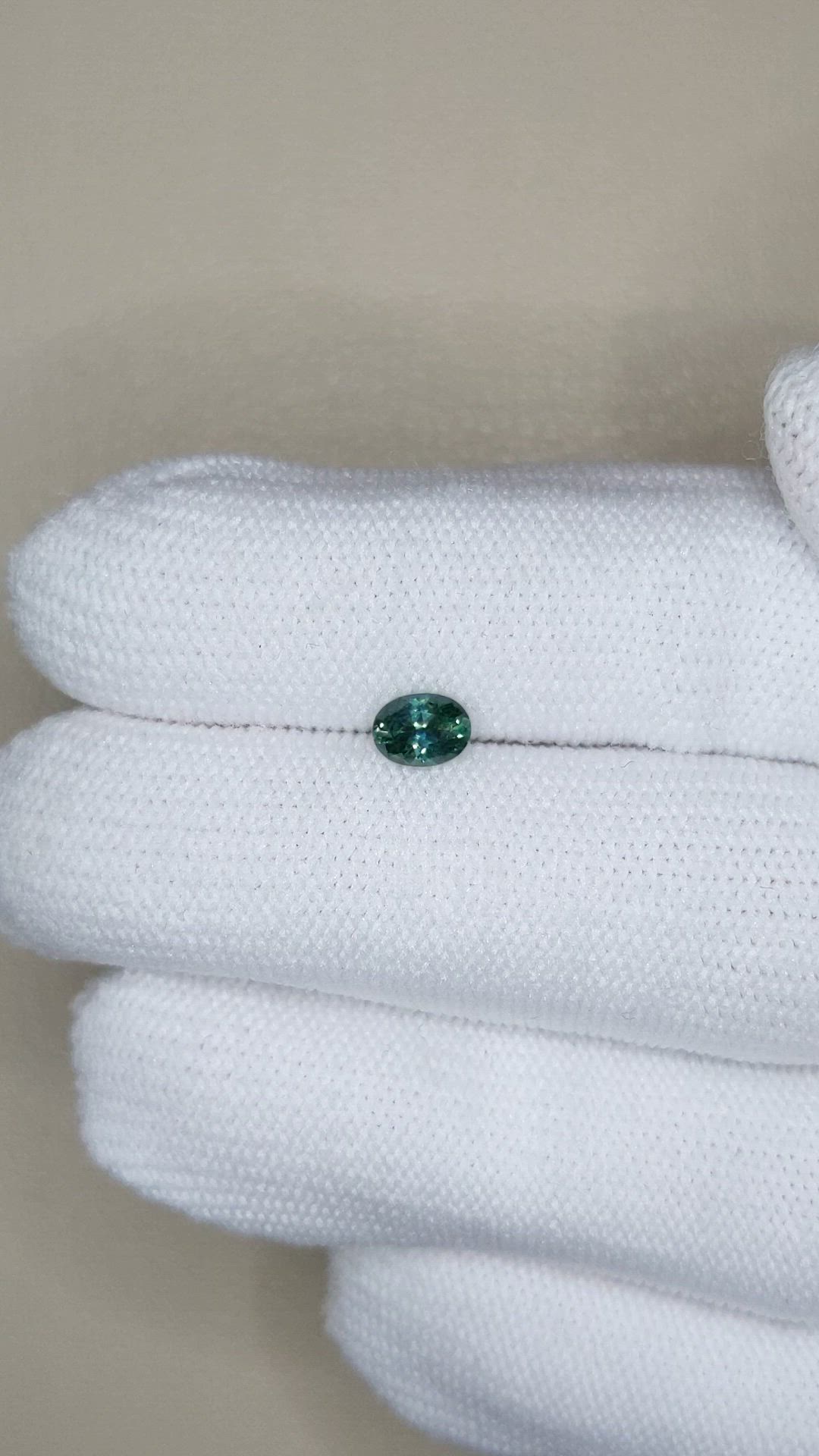 0.49 Ct. Bluish Green Sapphire from Montana Size Video