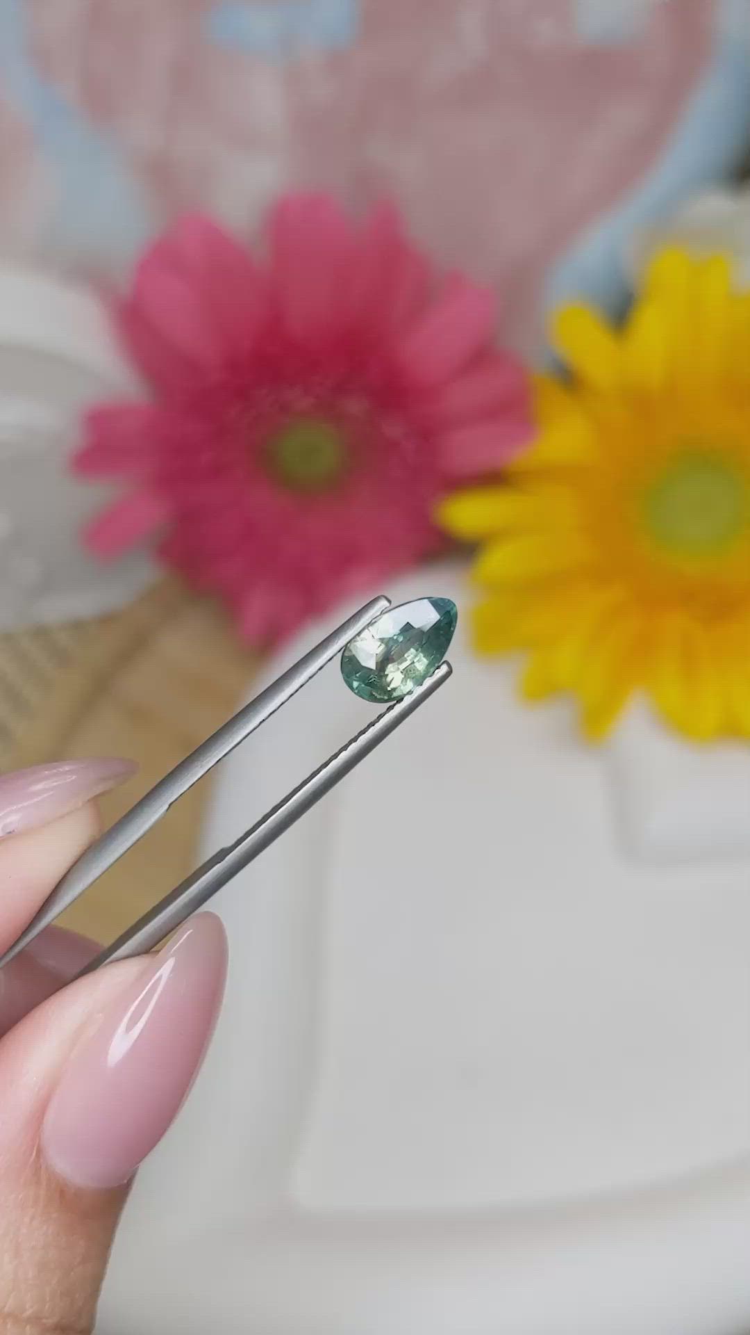 1.56 Ct. Bluish Green Sapphire from Madagascar Size Video