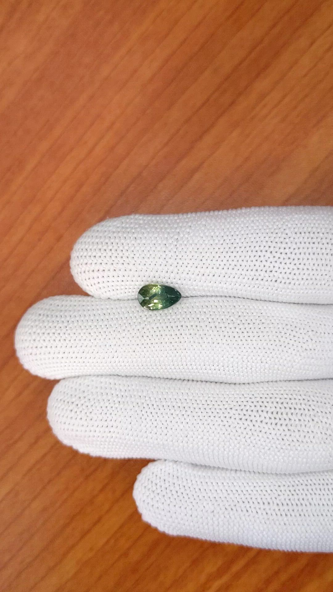 1.56 Ct. Bluish Green Sapphire from Madagascar Size Video