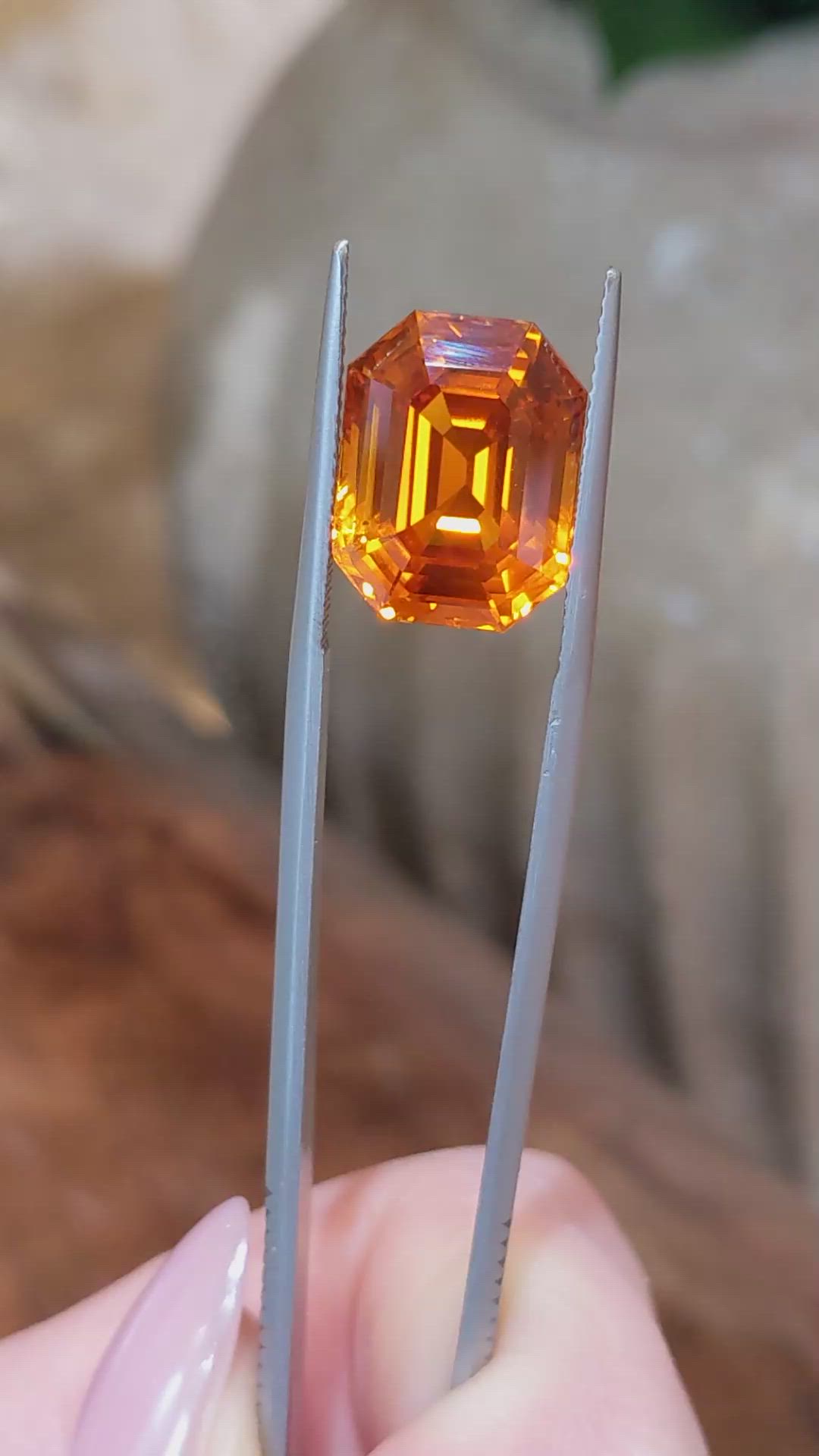 14.04 Ct. Orange Sapphire from Ceylon (Sri Lanka) Size Video