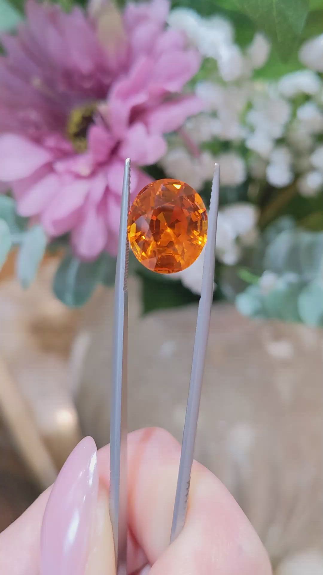 10.66 Ct. Orange Sapphire from Ceylon (Sri Lanka) Size Video