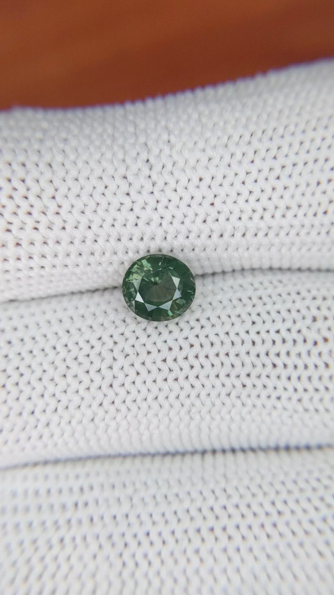 1.23 Ct. Brownish Green Sapphire from Madagascar Size Video