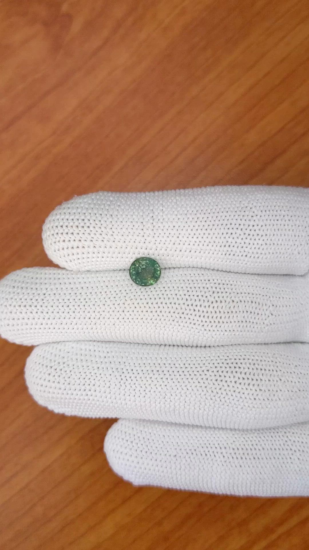 1.23 Ct. Brownish Green Sapphire from Madagascar Size Video