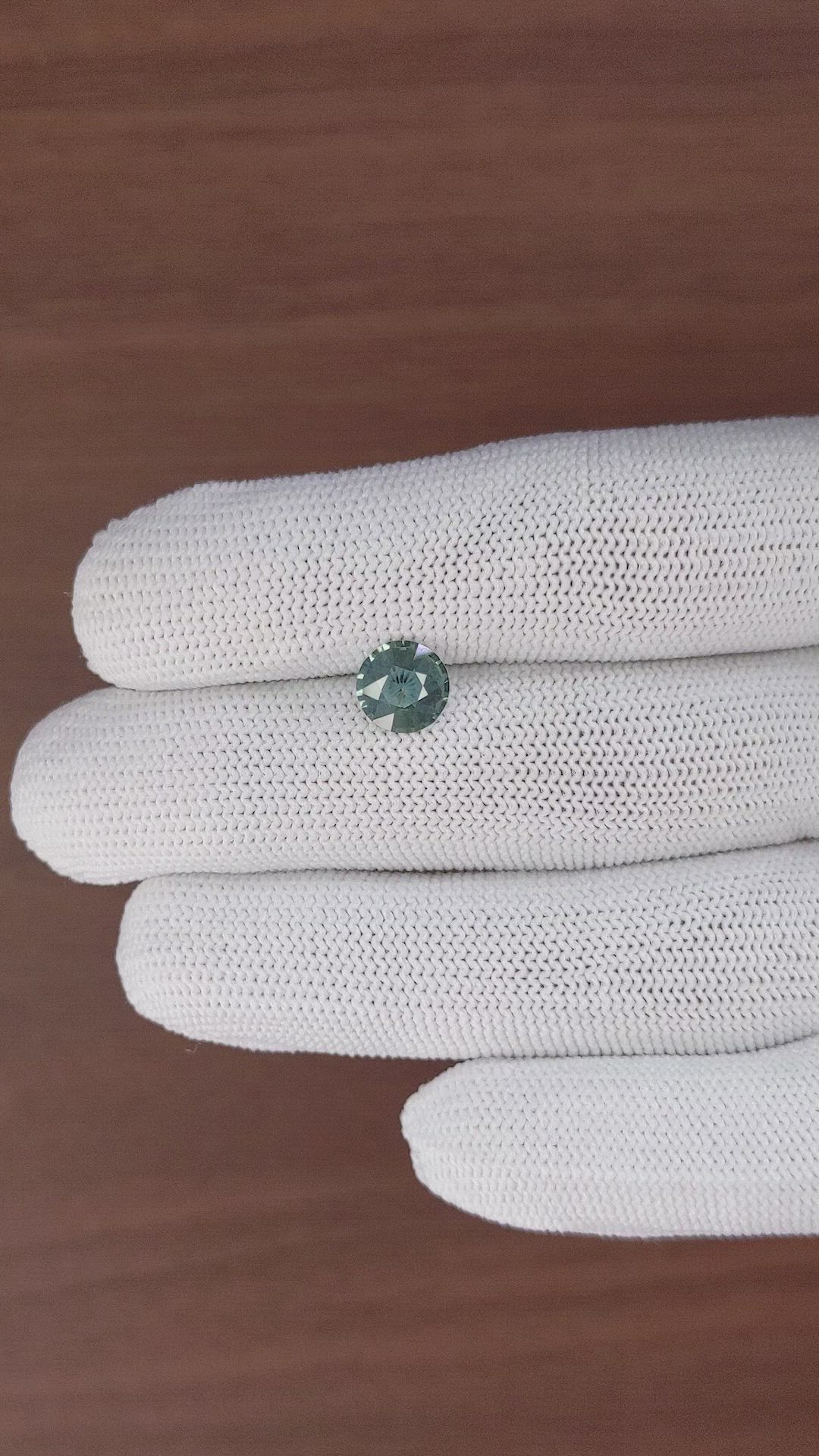 1.56 Ct. Bluish Green Sapphire from Madagascar Size Video