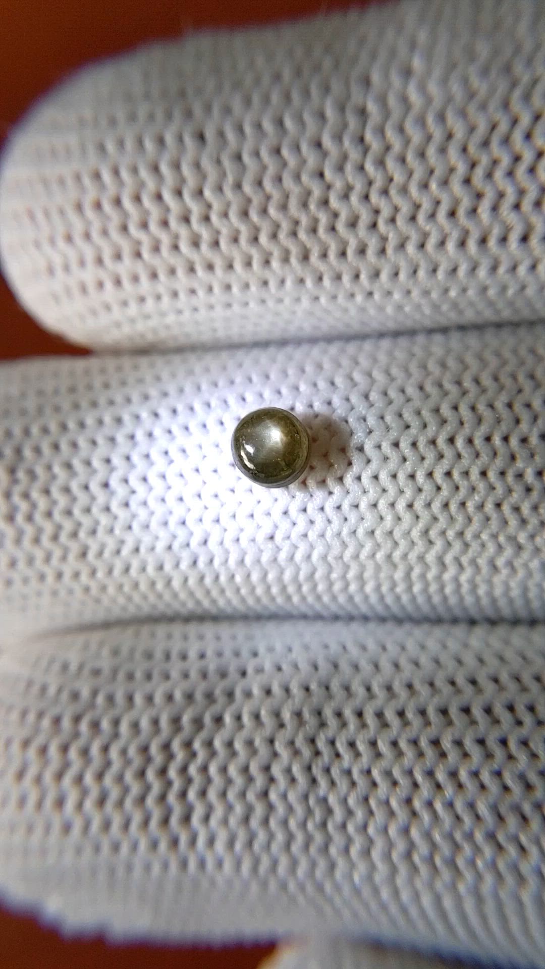 0.74 Ct. Greenish Brown Star Sapphire from Ceylon (Sri Lanka) Size Video