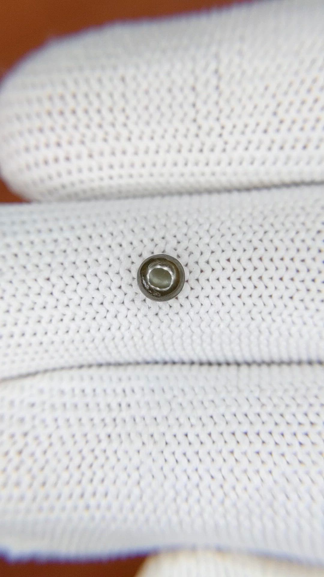 0.74 Ct. Greenish Brown Star Sapphire from Ceylon (Sri Lanka) Size Video