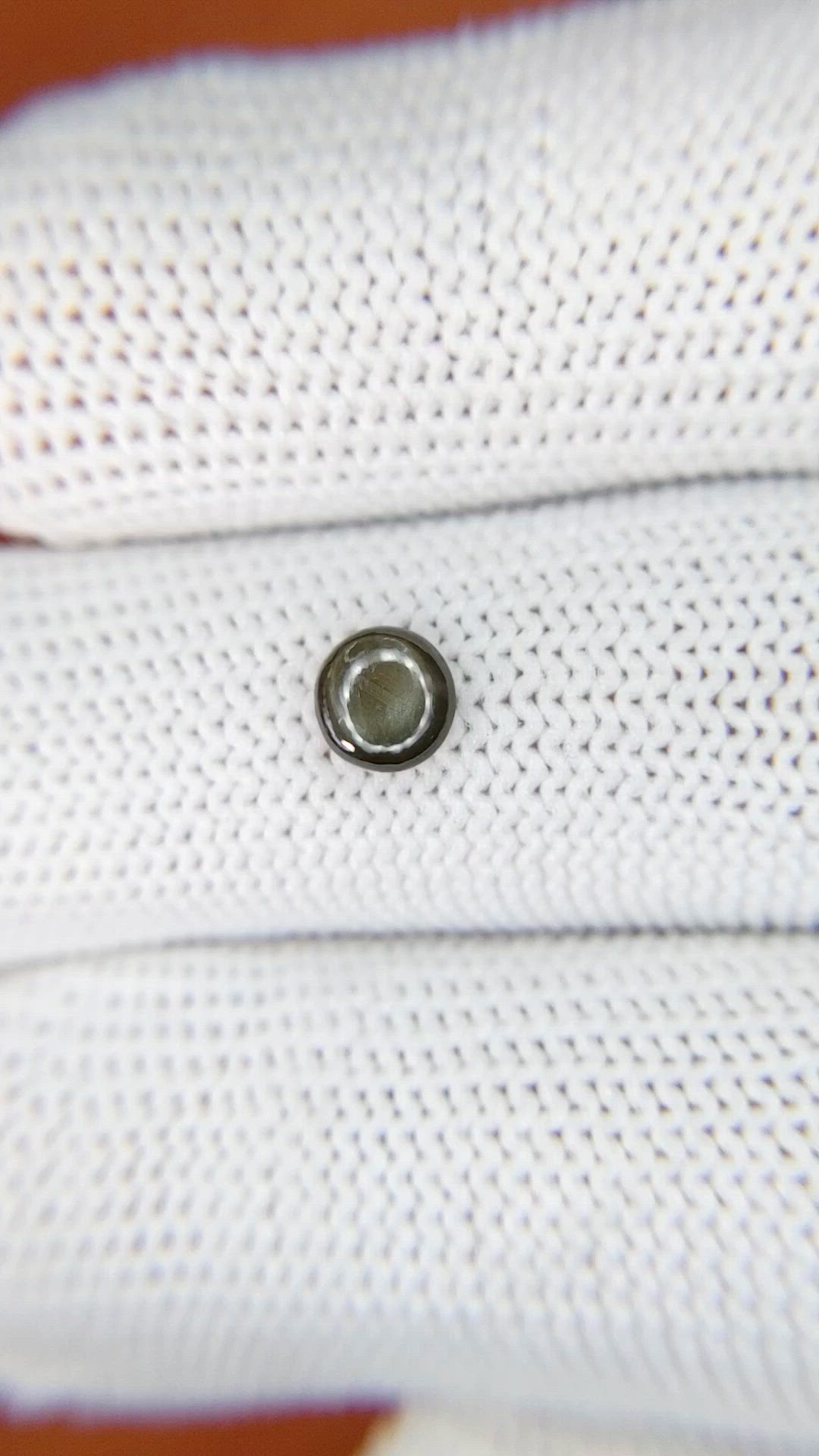 0.68 Ct. Brown Star Sapphire from Ceylon (Sri Lanka) Size Video
