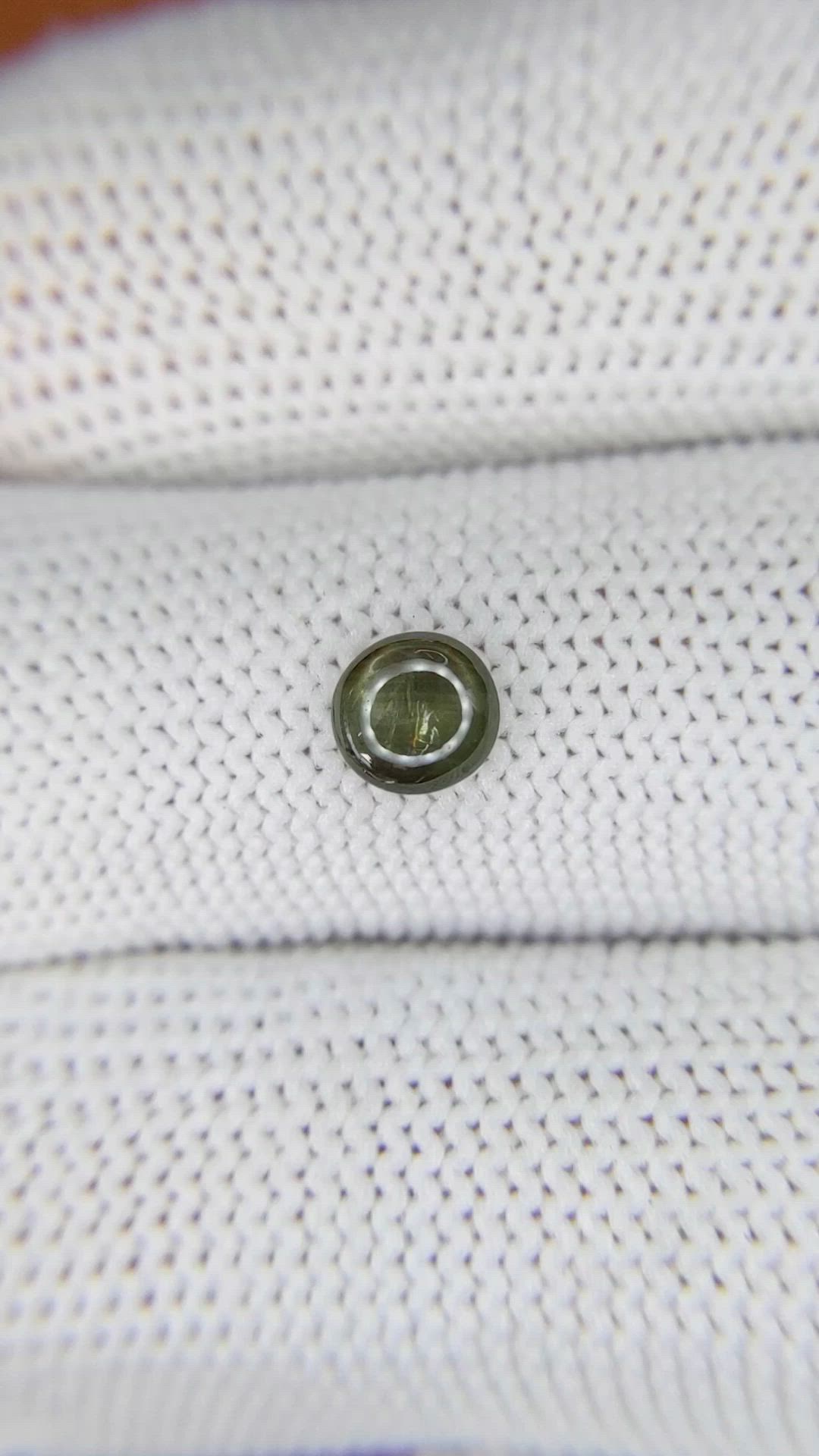 0.75 Ct. Brownish Green Star Sapphire from Ceylon (Sri Lanka) Size Video
