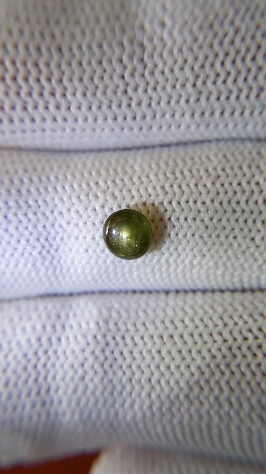0.75 Ct. Brownish Green Star Sapphire from Ceylon (Sri Lanka) Size Video