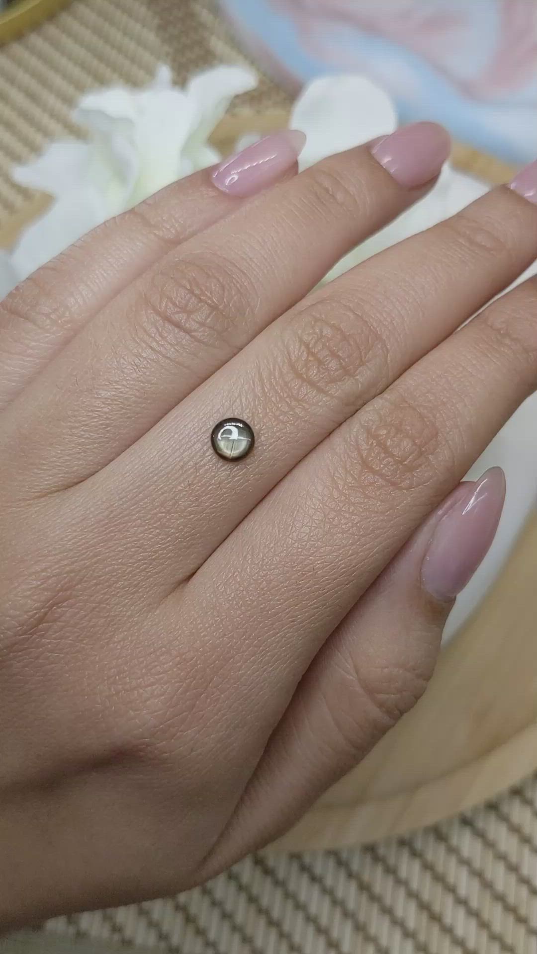 0.75 Ct. Brownish Green Star Sapphire from Ceylon (Sri Lanka) Size Video
