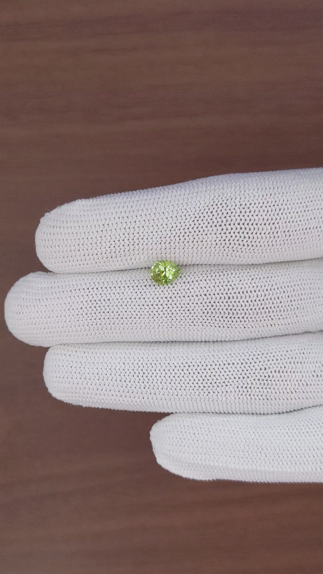 0.83 Ct. Yellowish Green Sapphire from Madagascar Size Video