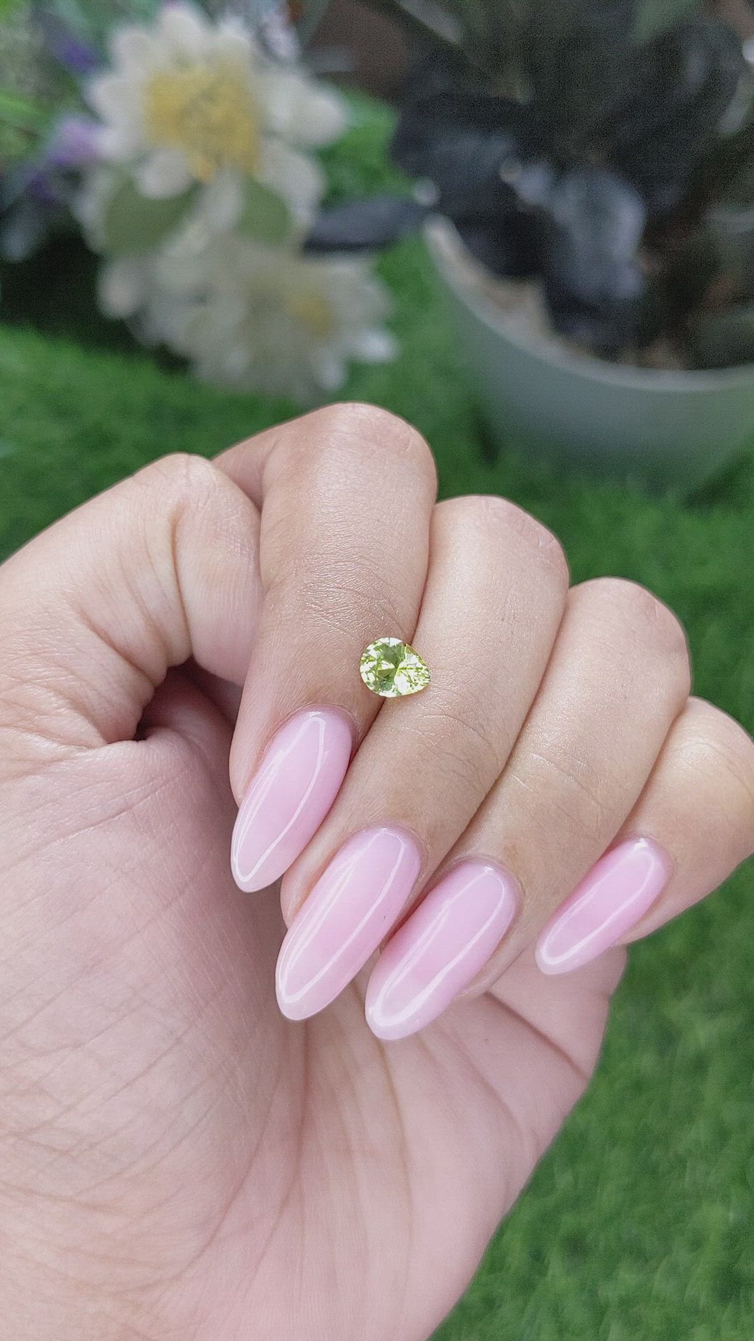 0.83 Ct. Yellowish Green Sapphire from Madagascar Size Video