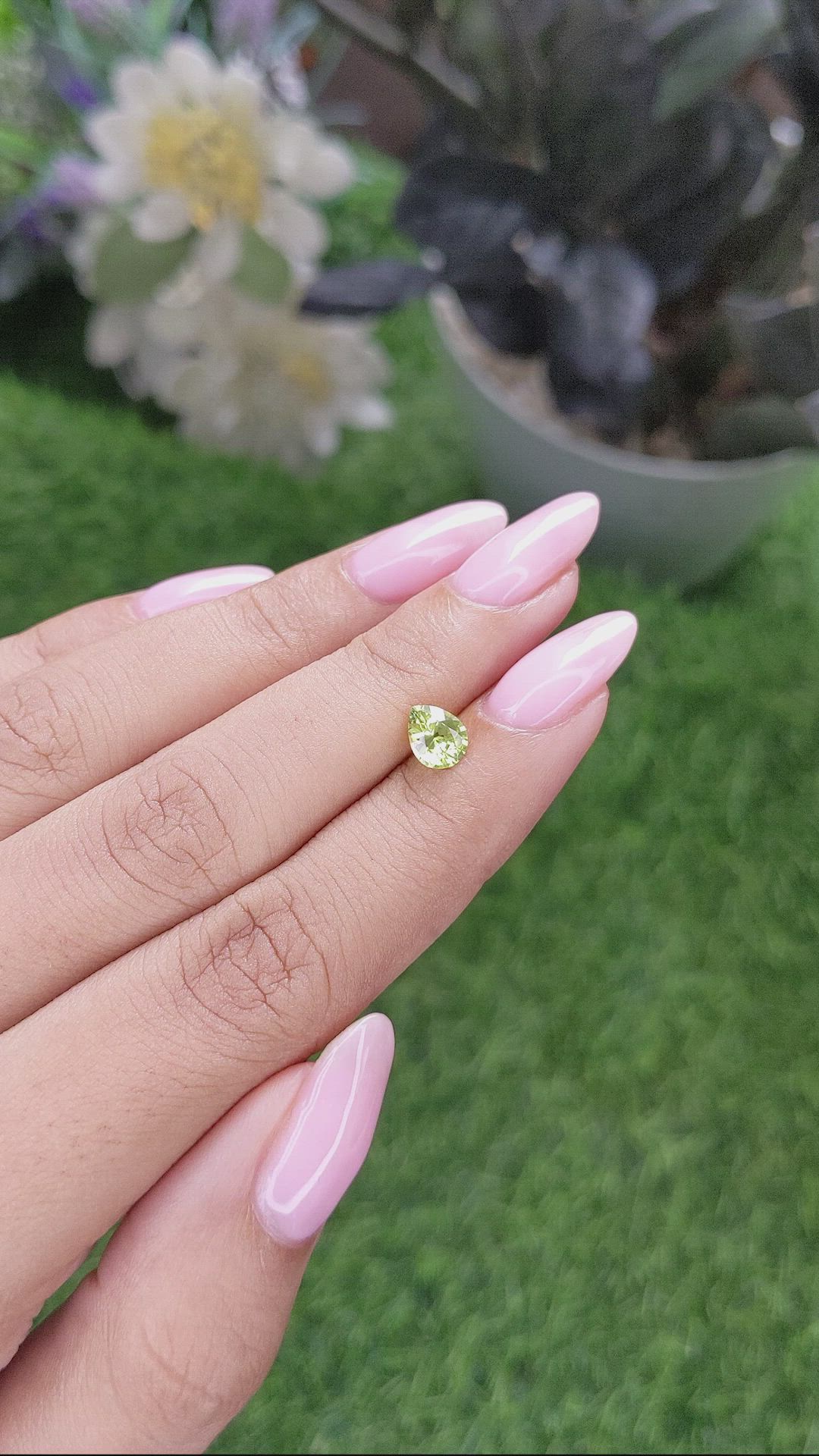 0.83 Ct. Yellowish Green Sapphire from Madagascar Size Video
