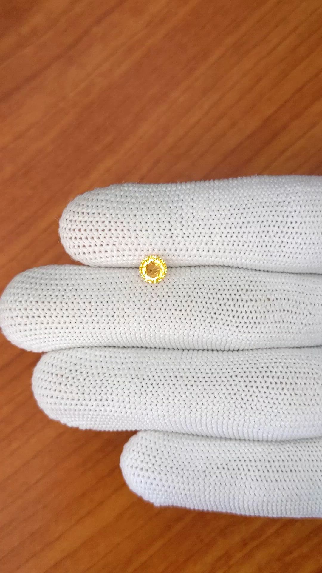 0.70 Ct. Orangish Yellow Sapphire from Ceylon (Sri Lanka) Size Video