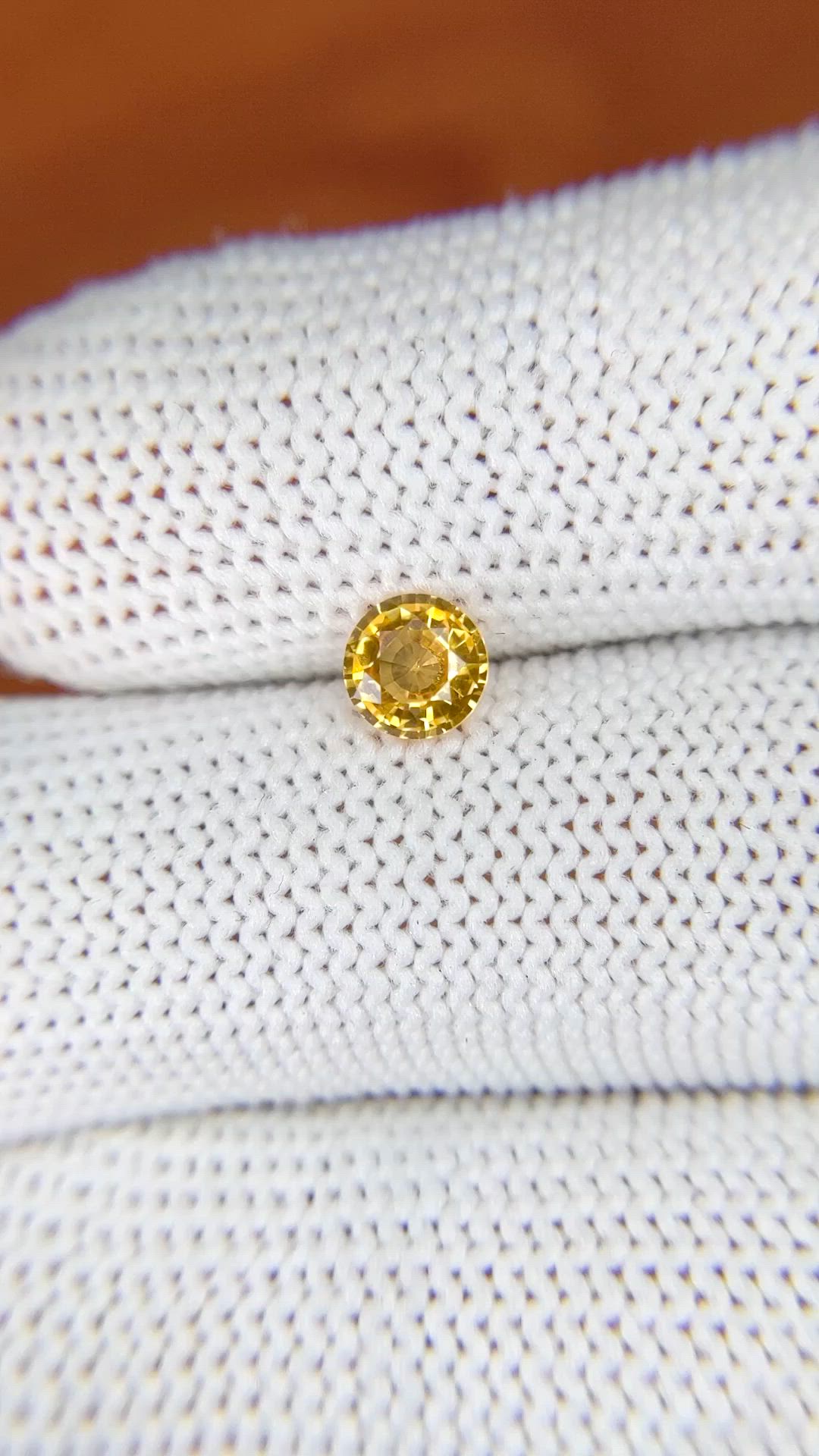 0.70 Ct. Orangish Yellow Sapphire from Ceylon (Sri Lanka) Size Video