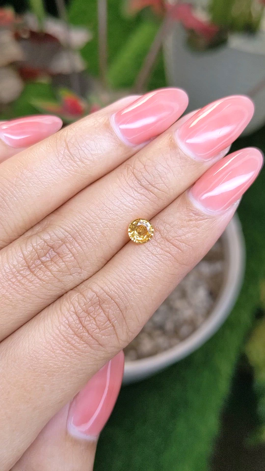 0.70 Ct. Orangish Yellow Sapphire from Ceylon (Sri Lanka) Size Video
