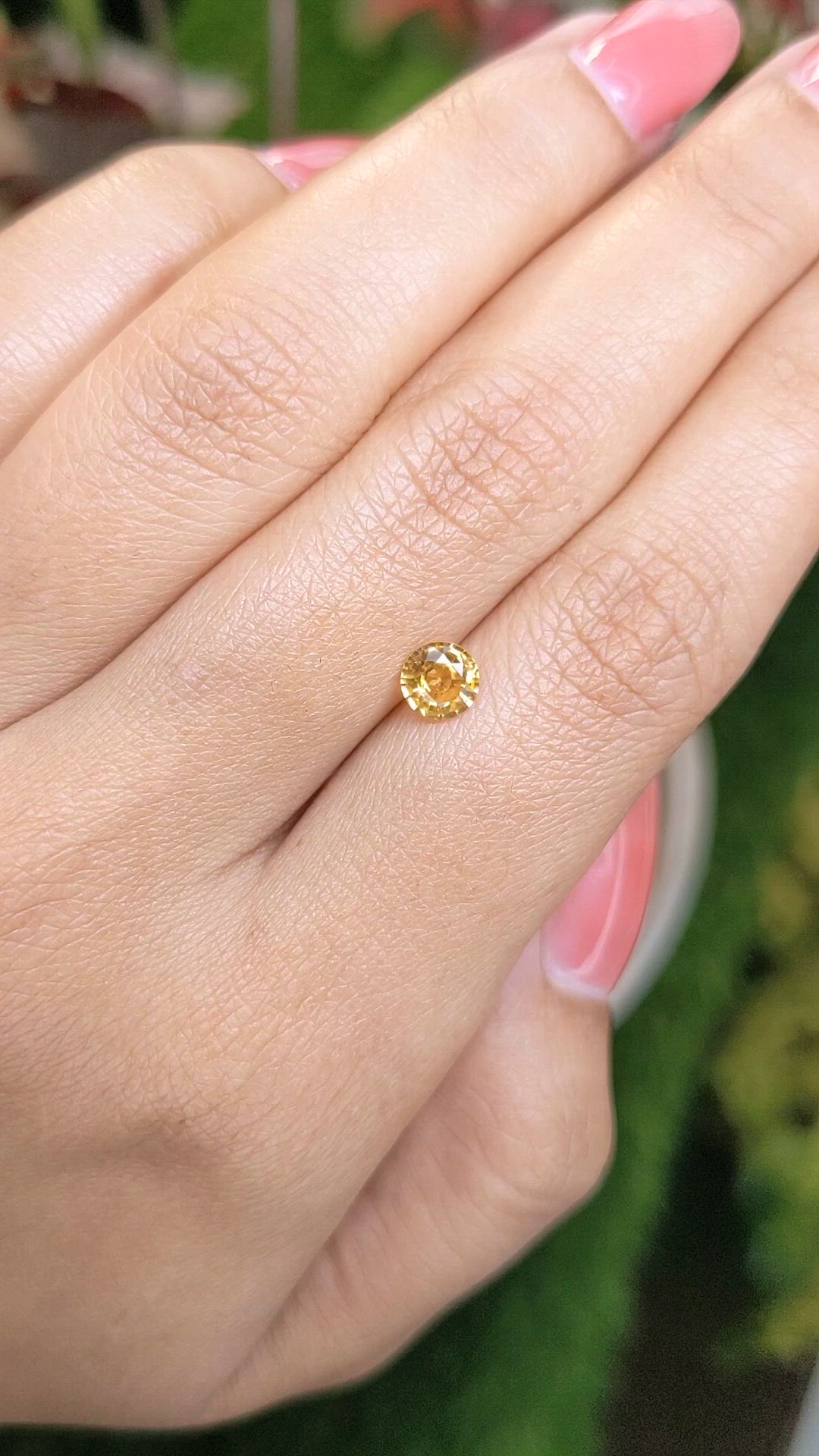 0.70 Ct. Orangish Yellow Sapphire from Ceylon (Sri Lanka) Size Video