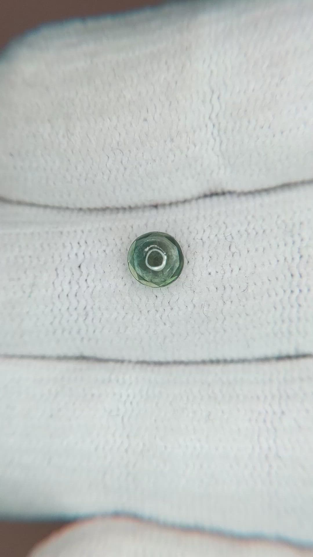 0.73 Ct. Bluish Green Sapphire from Montana Size Video