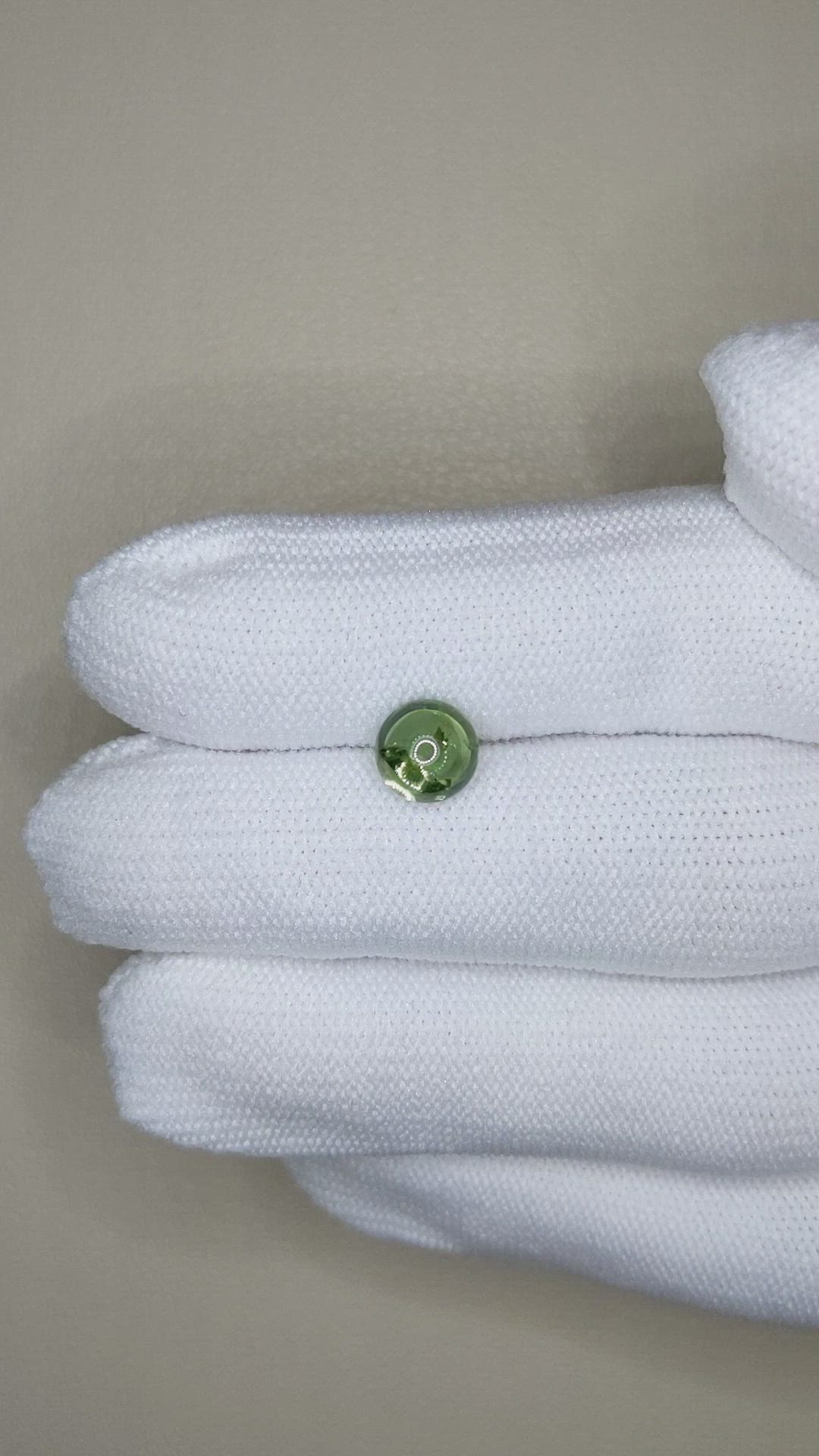 2.12 Ct. Yellowish Green Cabochon Sapphire from Montana Size Video