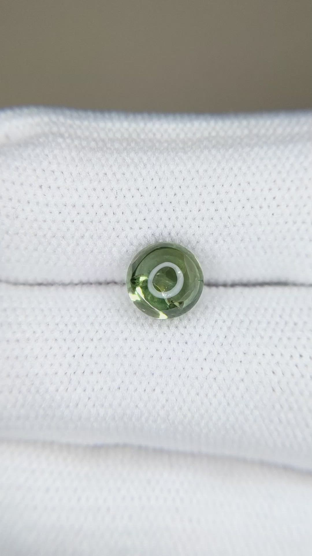 2.12 Ct. Yellowish Green Cabochon Sapphire from Montana Size Video