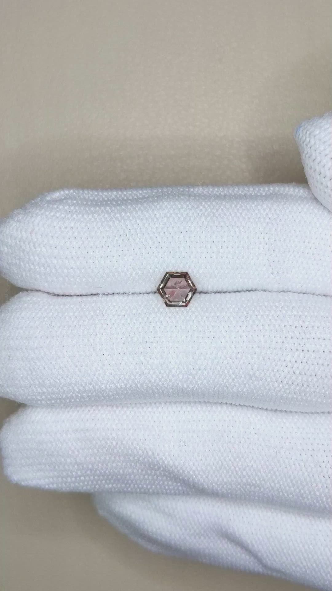 0.48 Ct. Peach Sapphire from Montana Size Video