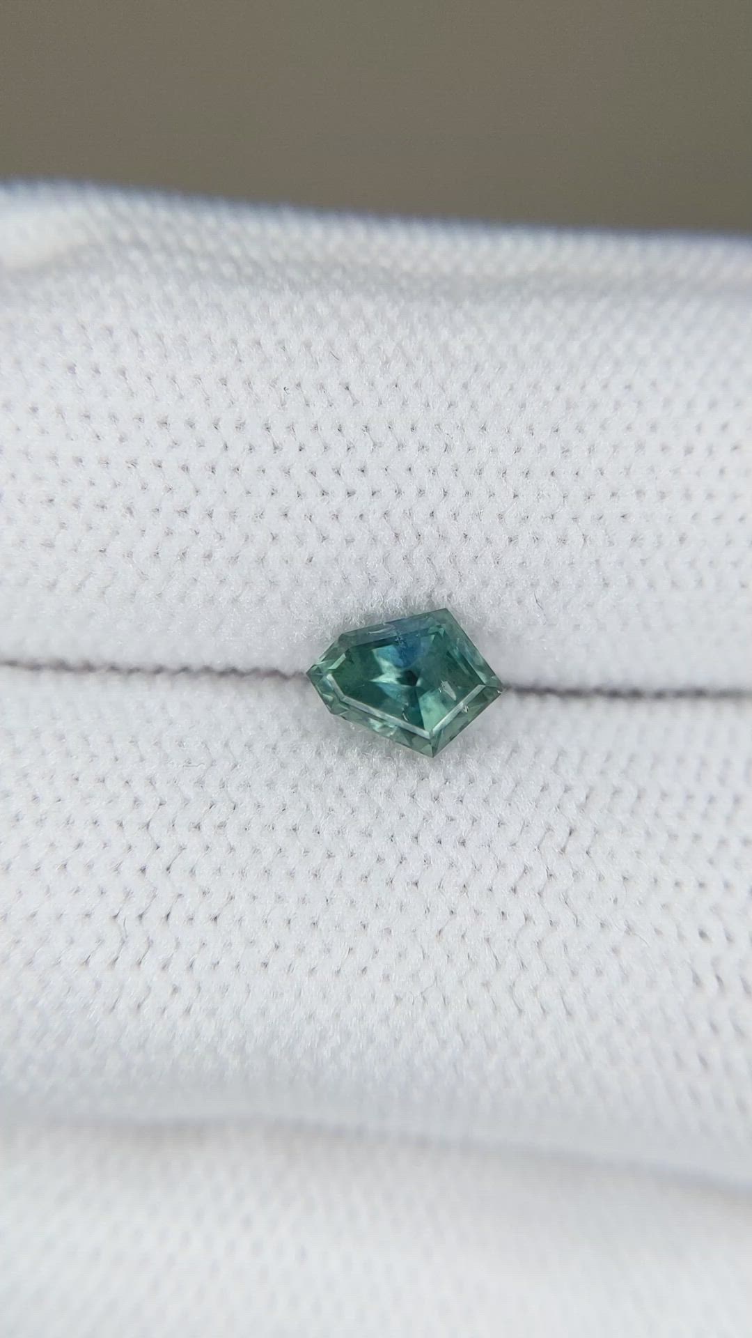 0.73 Ct. Bluish Green Sapphire from Montana Size Video