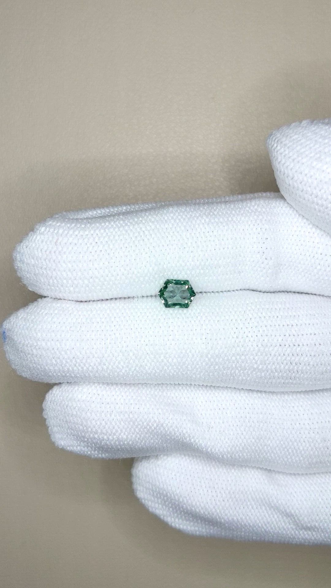 0.69 Ct. Bluish Green Sapphire from Montana Size Video