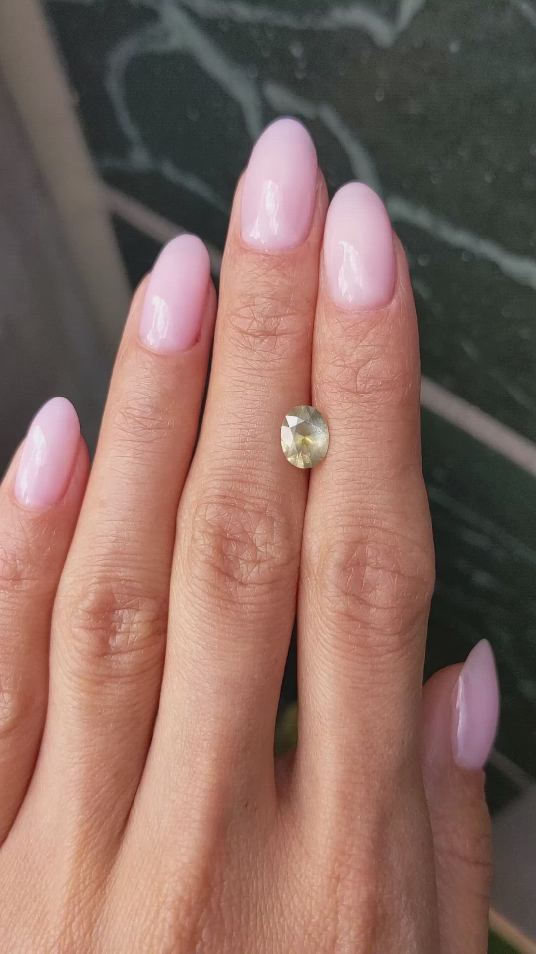 1.39 Ct. Yellowish Green Sapphire from Montana Size Video