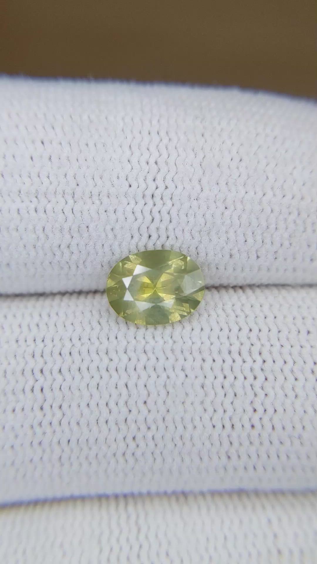 1.39 Ct. Yellowish Green Sapphire from Montana Size Video