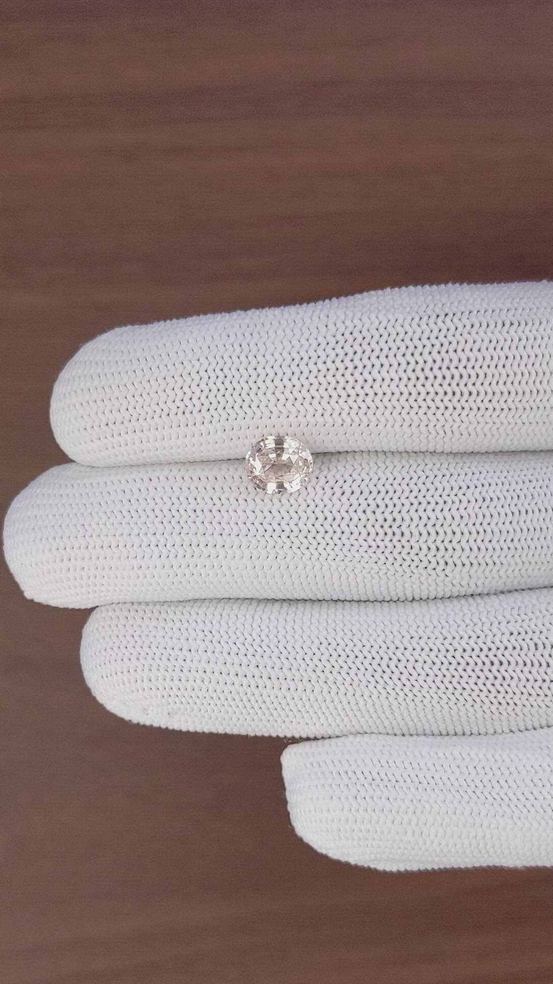 1.73 Ct. Peach Sapphire from Madagascar Size Video