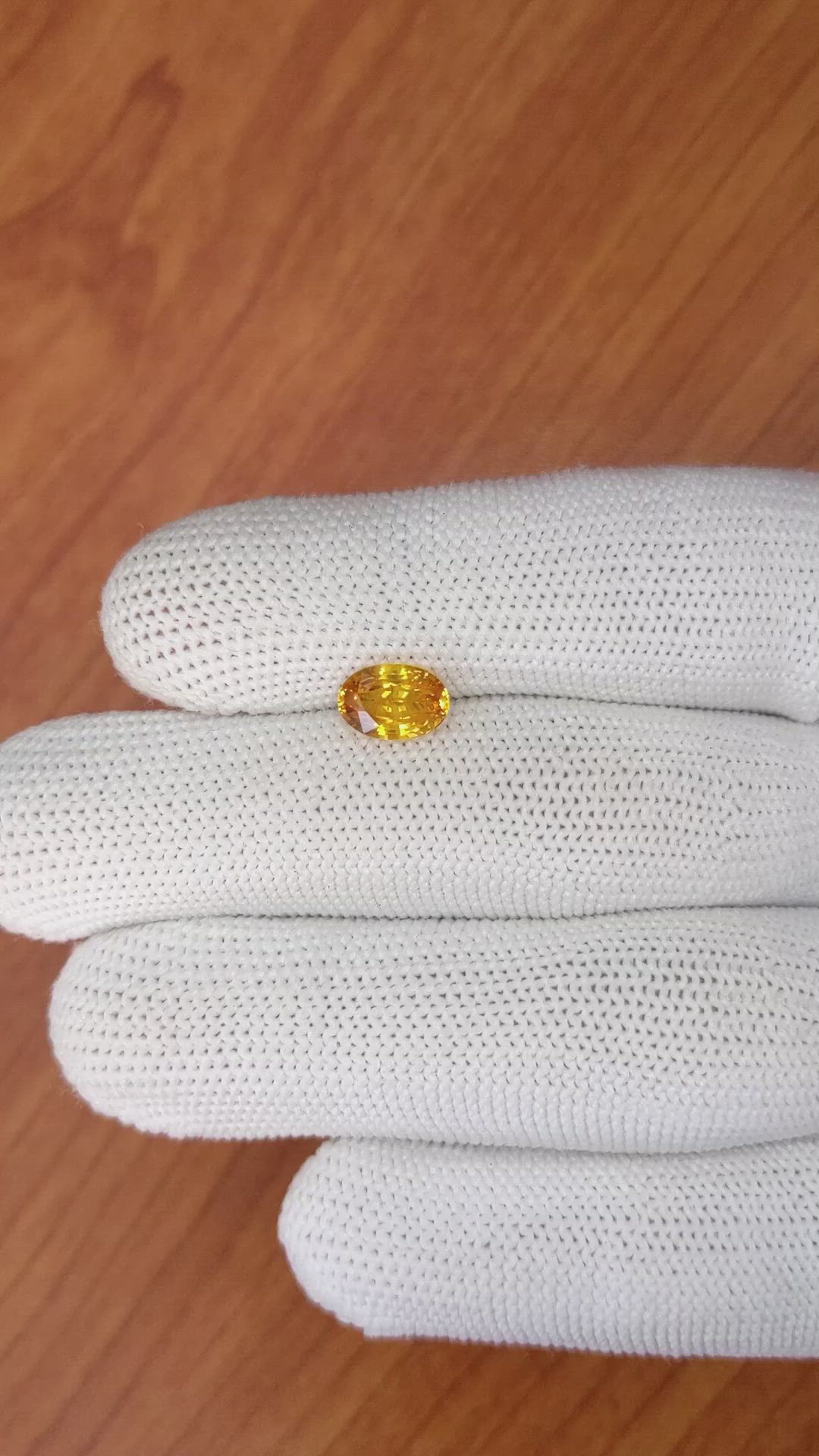 1.85 Ct. Yellowish Orange Sapphire from Ceylon (Sri Lanka) Size Video