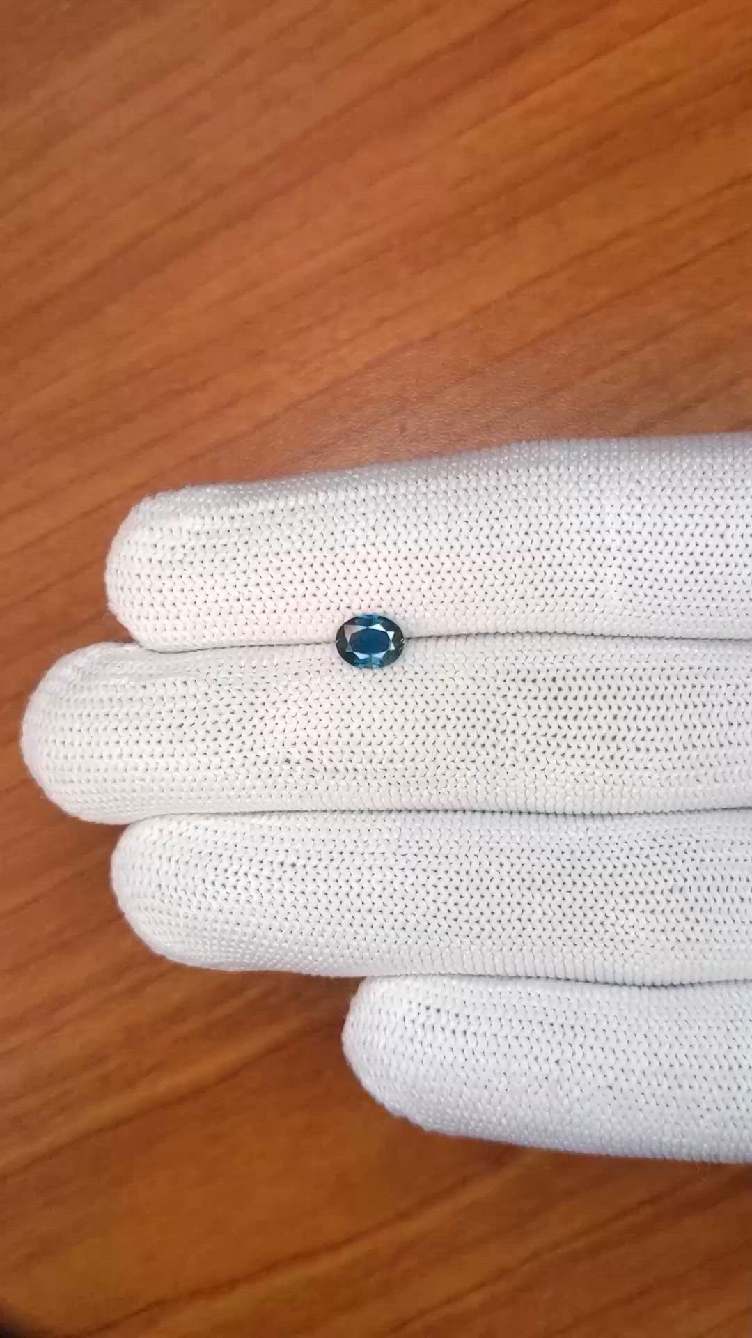 0.65 Ct. Greenish Blue Sapphire from Ceylon (Sri Lanka) Size Video