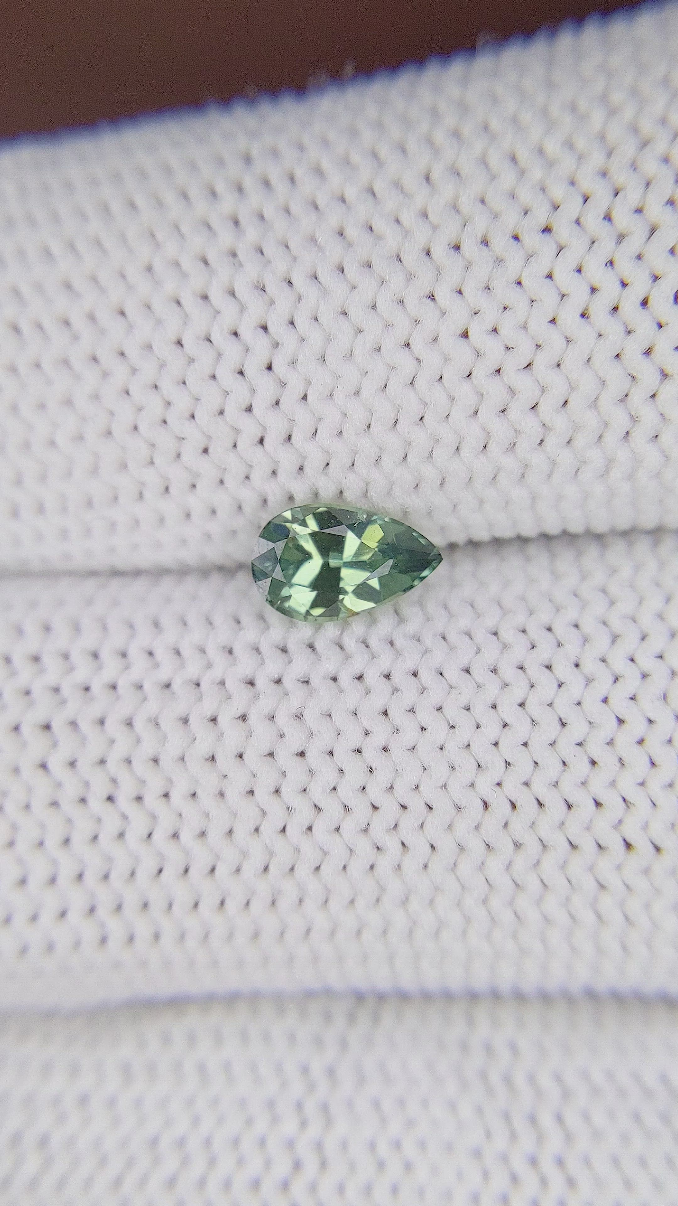0.69 Ct. Yellowish Green Sapphire from Madagascar Size Video