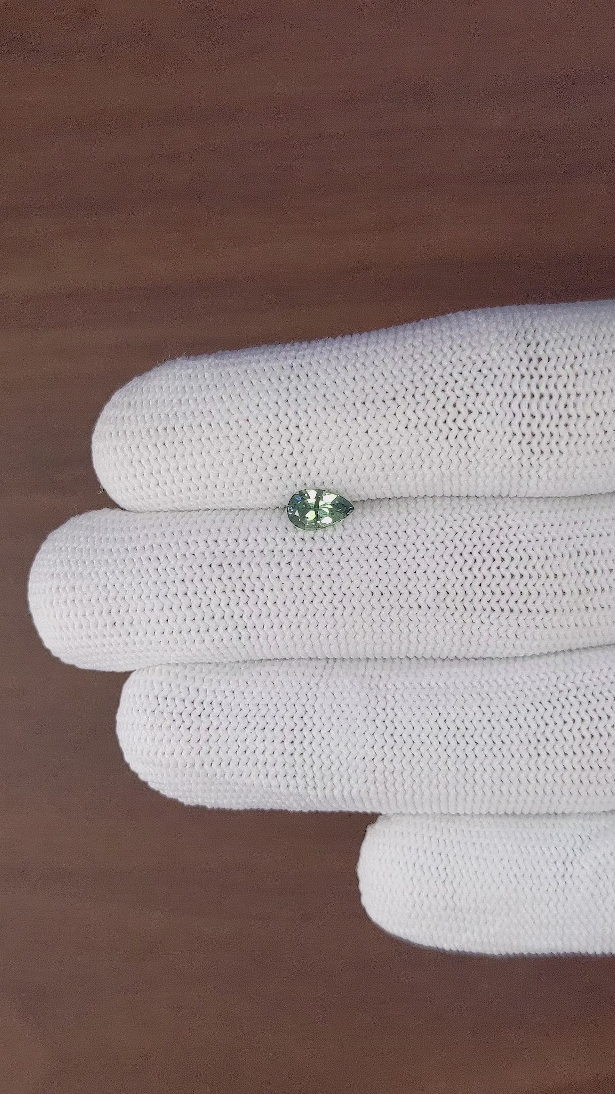 0.69 Ct. Yellowish Green Sapphire from Madagascar Size Video