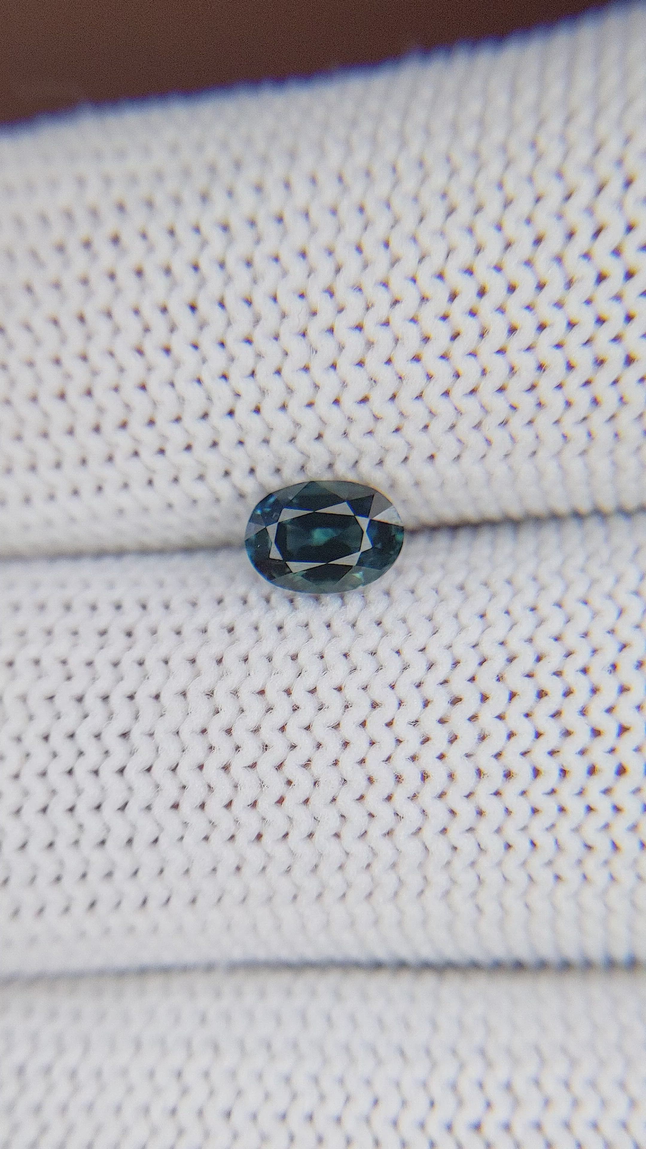 0.71 Ct. Greenish Blue Sapphire from Madagascar Size Video