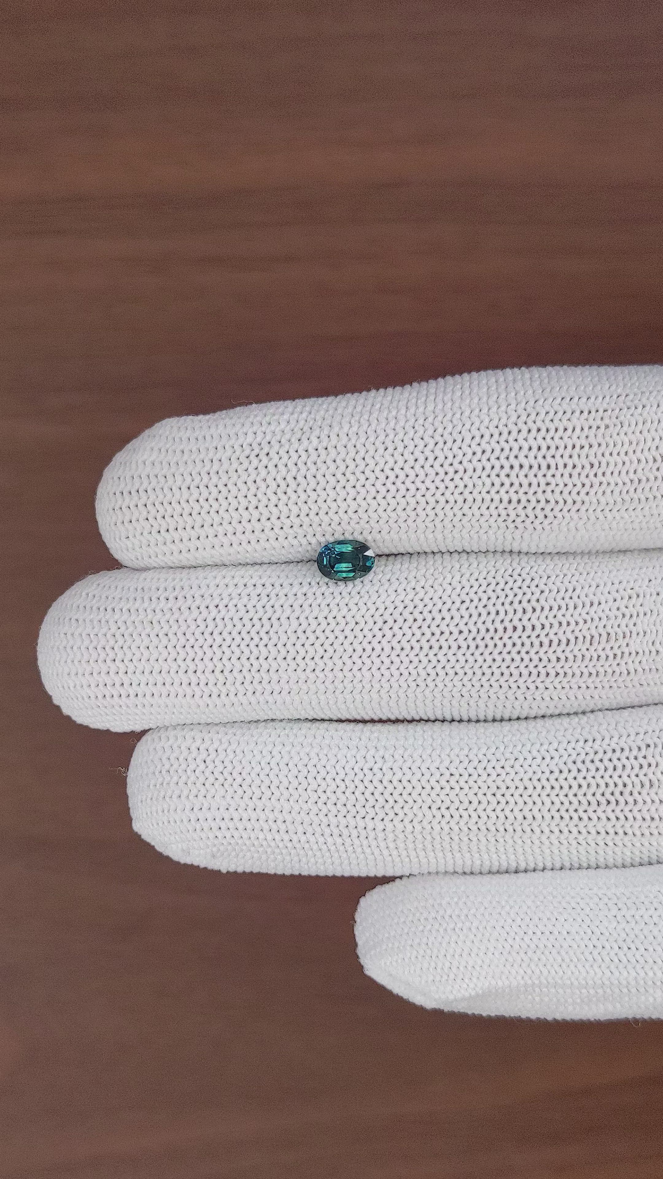 0.71 Ct. Greenish Blue Sapphire from Madagascar Size Video
